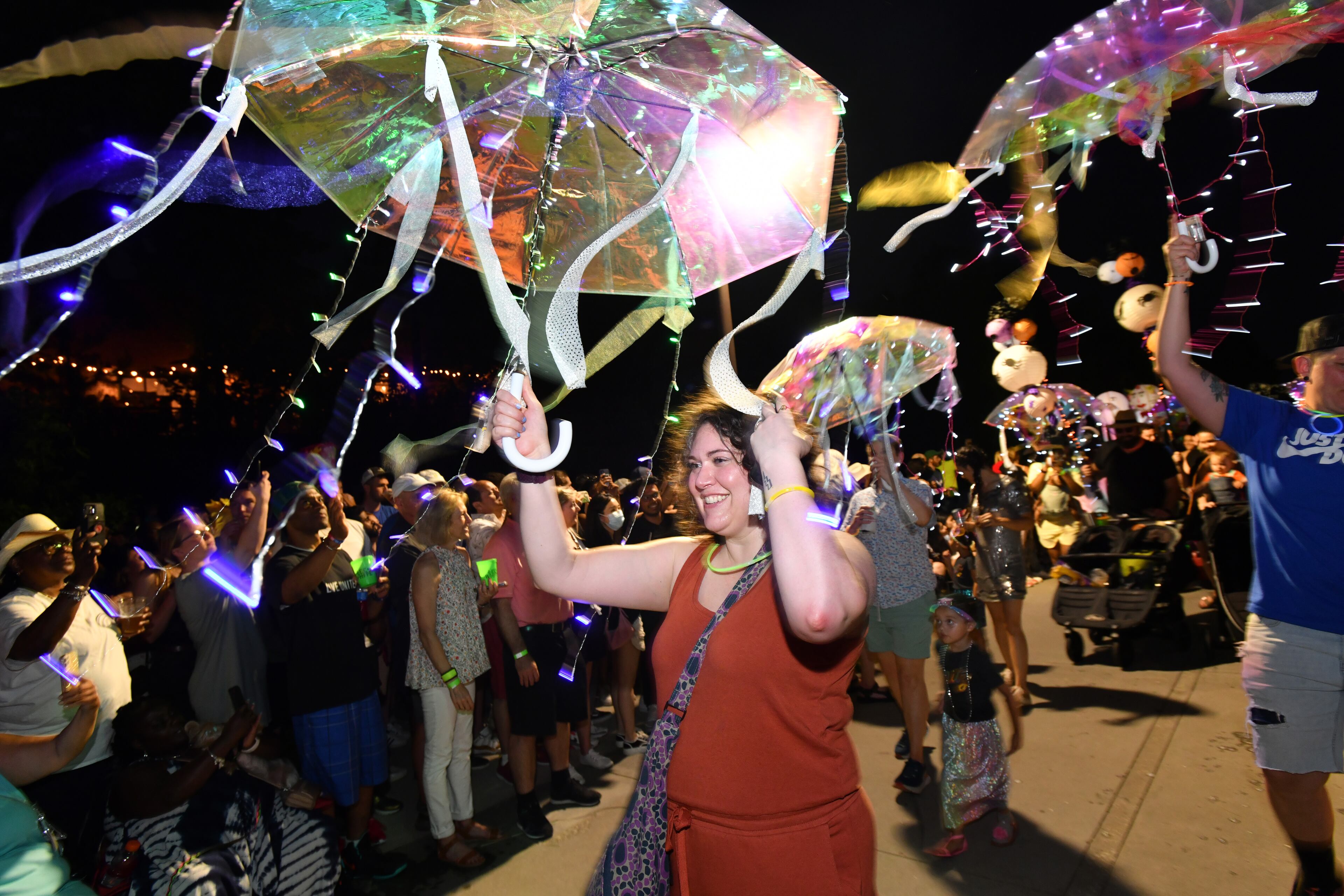 Thousands of participants and onlookers enjoy the Atlanta Beltline Lantern Parade on the Westside Trail on Saturday, May 21, 2022. The nighttime parade began in 2010, and has grown into an event that in recent years brought more than 70,000 people to the Beltline for the procession of illuminated paper creations of all shapes and types. (Hyosub Shin / Hyosub.Shin@ajc.com)