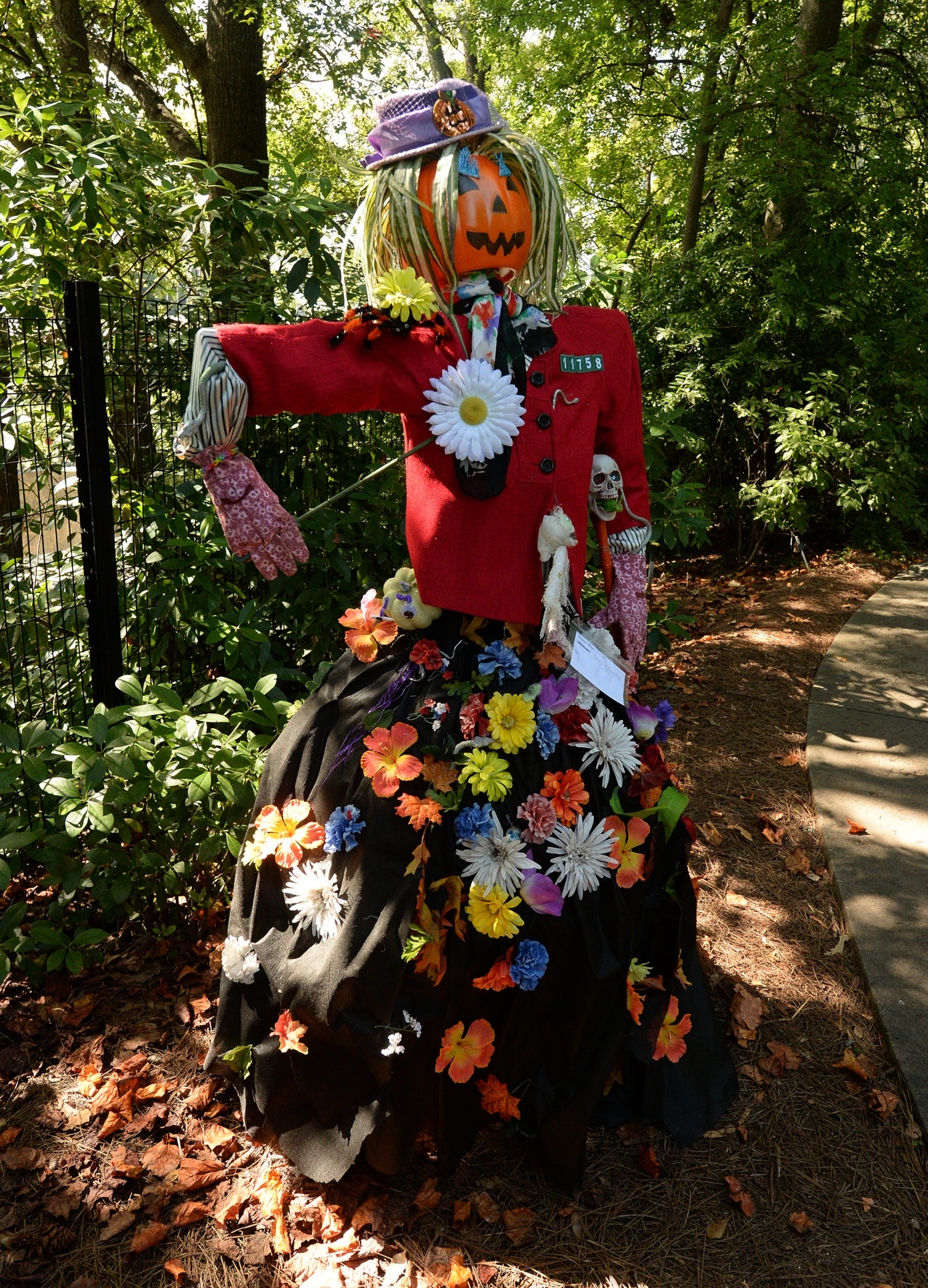 Junior Girl Scout Troop 11758's Garden Witch at the Atlanta Botanical Garden on Wednesday, October 2, 2013. This was one of over 125 scarecrows hand crafted by businesses, individuals, schools and organizations. The creative scarecrows share the stage with the larger than life plant creatures of Imaginary Worlds. JOHNNY CRAWFORD / JCRAWFORD@AJC.COM JOHNNY CRAWFORD / JCRAWFORD@AJC.COM