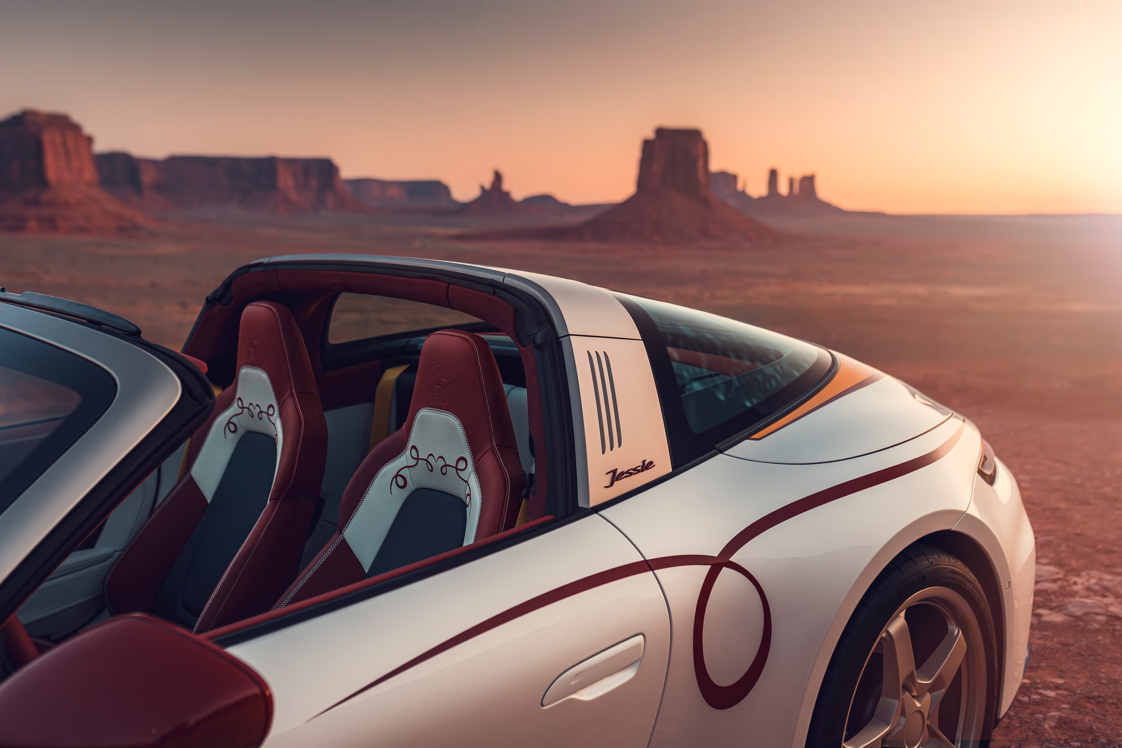 The Jessie-inspired 911 Targa 4 GTS replaces the targa designation on the roll bar with her name, includes her “yeehaw” catchphrase on the door sill guard and features Western-inspired accents with denim and cowhide interior elements. (Courtesy of Porsche Cars North America)