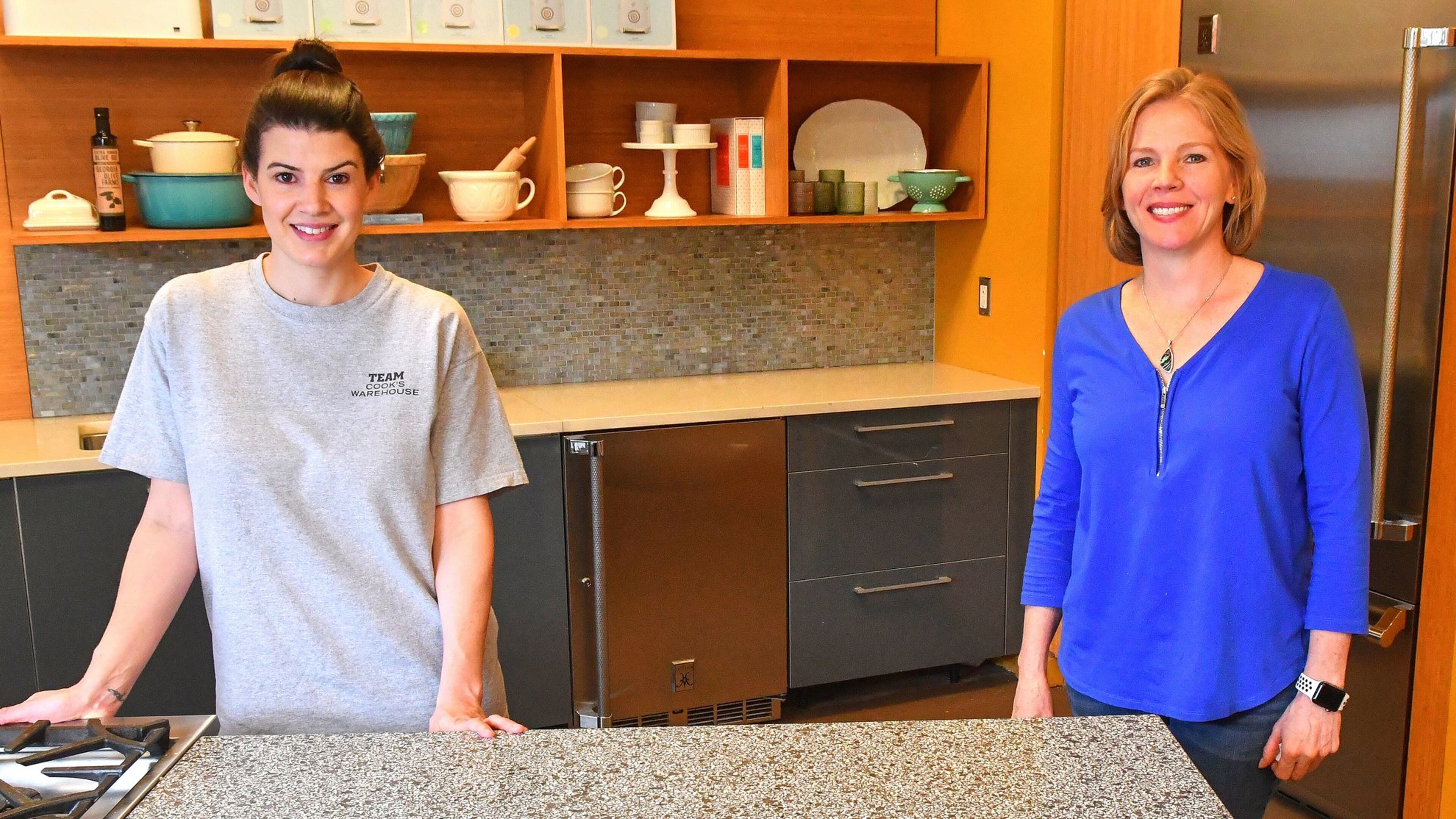 Nealey Thompson (left), Cook’s Warehouse’s cooking school director, and Cook’s Warehouse founder and CEO Mary Moore.