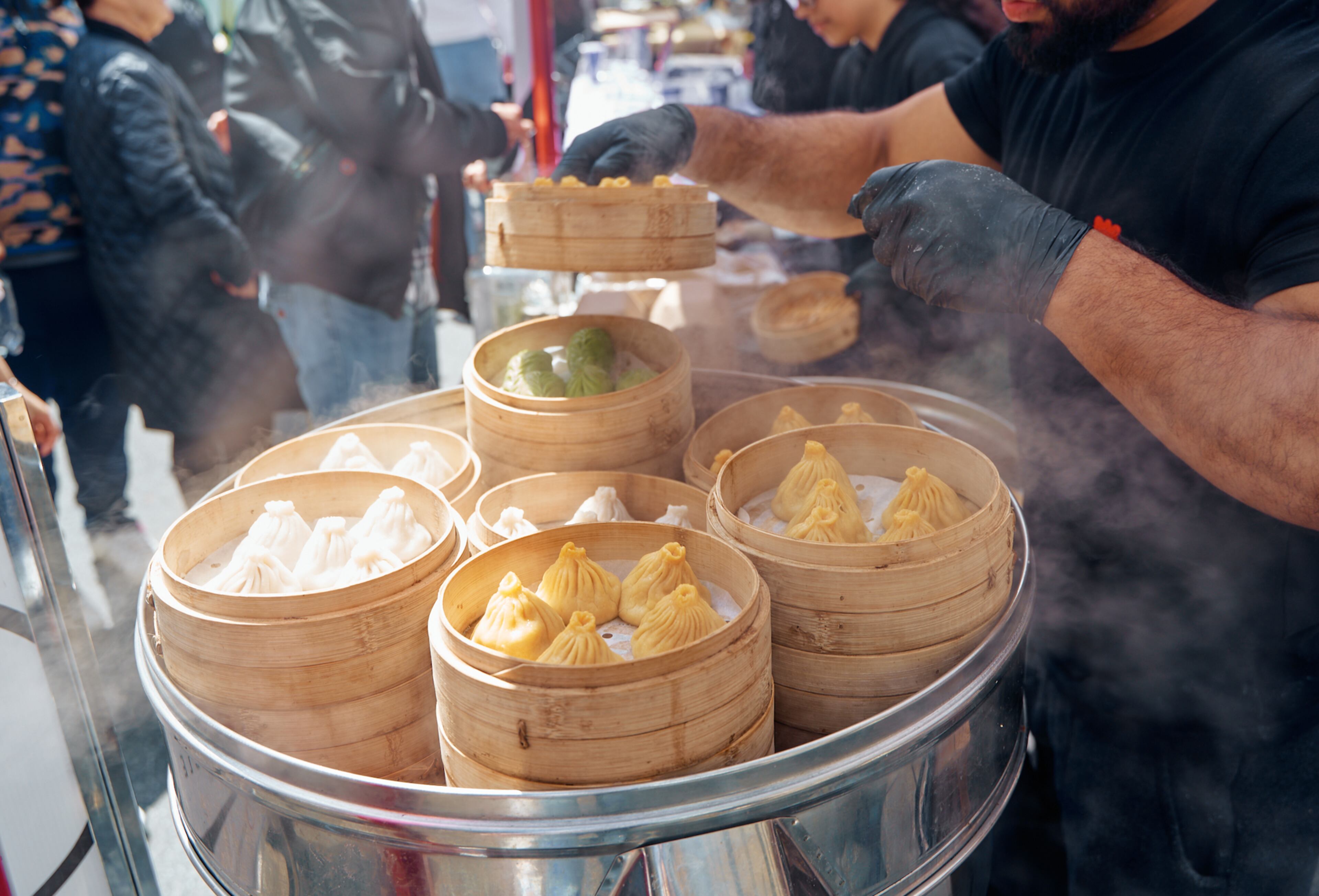 Steamed dumplings are served during Panda Day in New York. The success of Panda Day inspired founder BiuBiu Xu to expand the street fair to a three-day, national touring festival, which starts in Atlanta April 4-6.