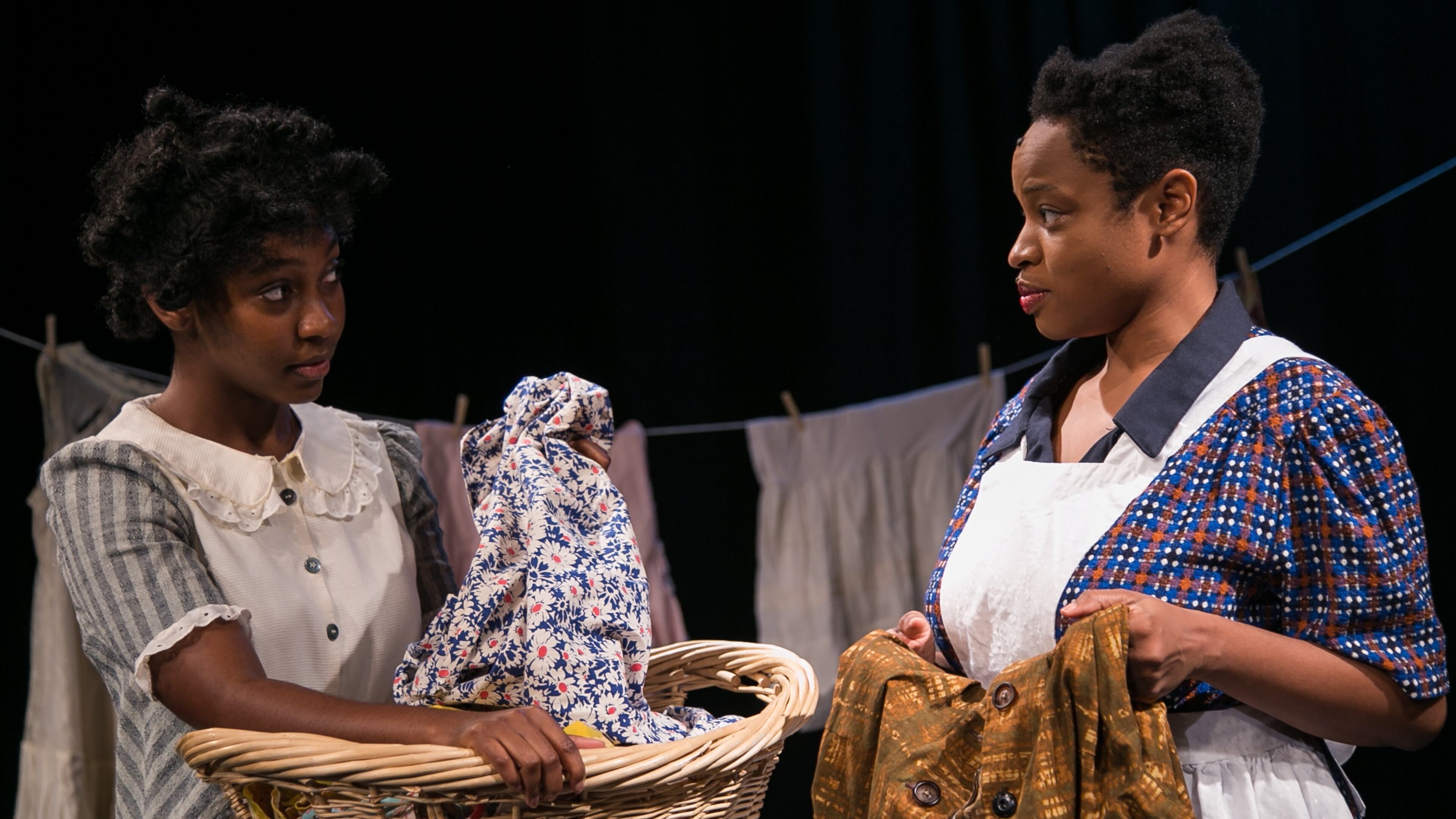 Synchronicity Theatre's stage production of "The Bluest Eye" (based on the Toni Morrison novel) features Niara Robinson (left) and Dionna D. Davis.
Courtesy of Casey Gardner Ford