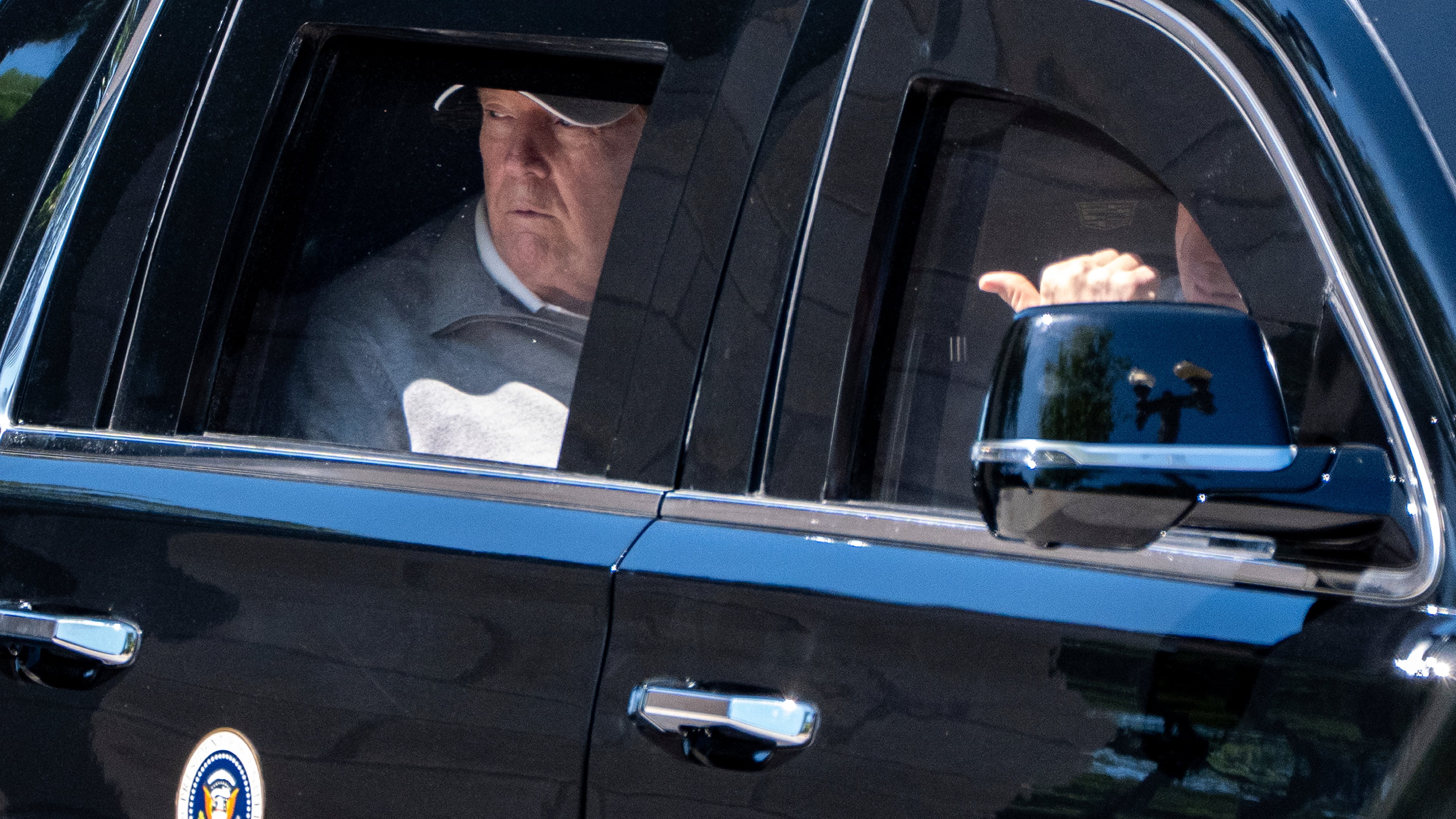 President Donald Trump looks out the window of his limousine at the construction in Lafayette Park as he departs the White House, Saturday, May 30, 2026, in Washington. (AP Photo/Alex Brandon)