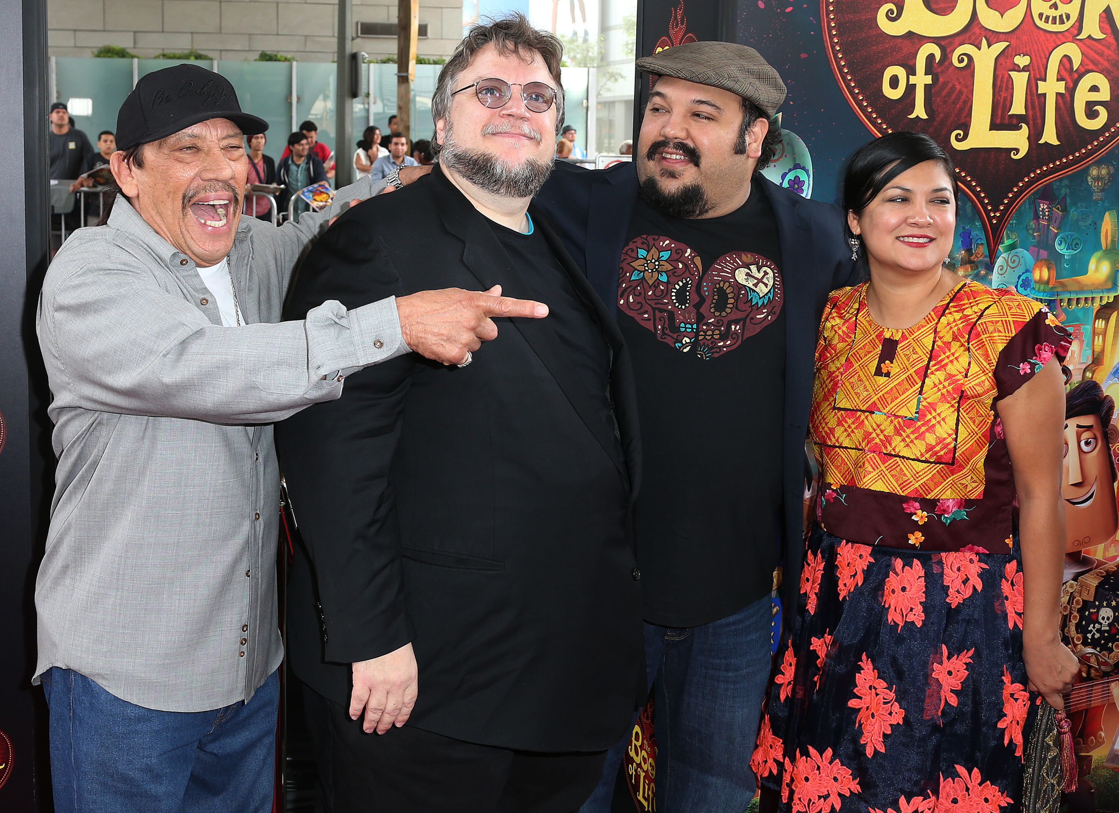 LOS ANGELES, CA - OCTOBER 12: (L-R) Actor Danny Trejo, executive producer Guillermo del Toro, director Jorge R. Gutierrez and a guest attend the Premiere of Twentieth Century Fox and Reel FX Animation Studois' "The Book of Life" at the Regal Cinemas L.A. Live on October 12, 2014 in Los Angeles, California. (Photo by Frederick M. Brown/Getty Images)