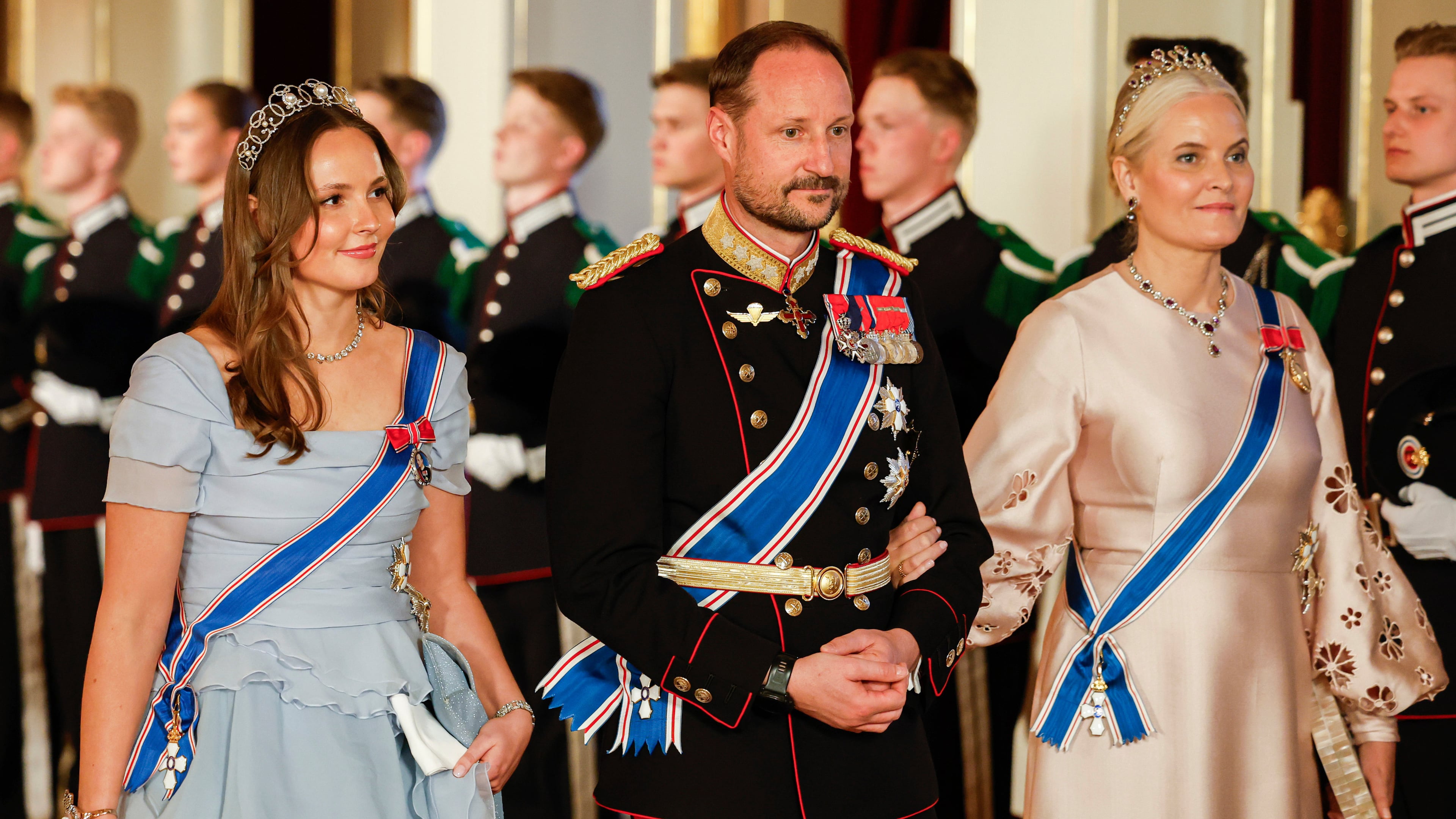 FILE - From left, Norway's Princess Ingrid Alexandra, left, Crown Prince Haakon and Crown Princess Mette-Marit on their way to a gala dinner at the Palace in Oslo, Tuesday, April 8, 2025. (Fredrik Varfjell/NTB via AP, File)