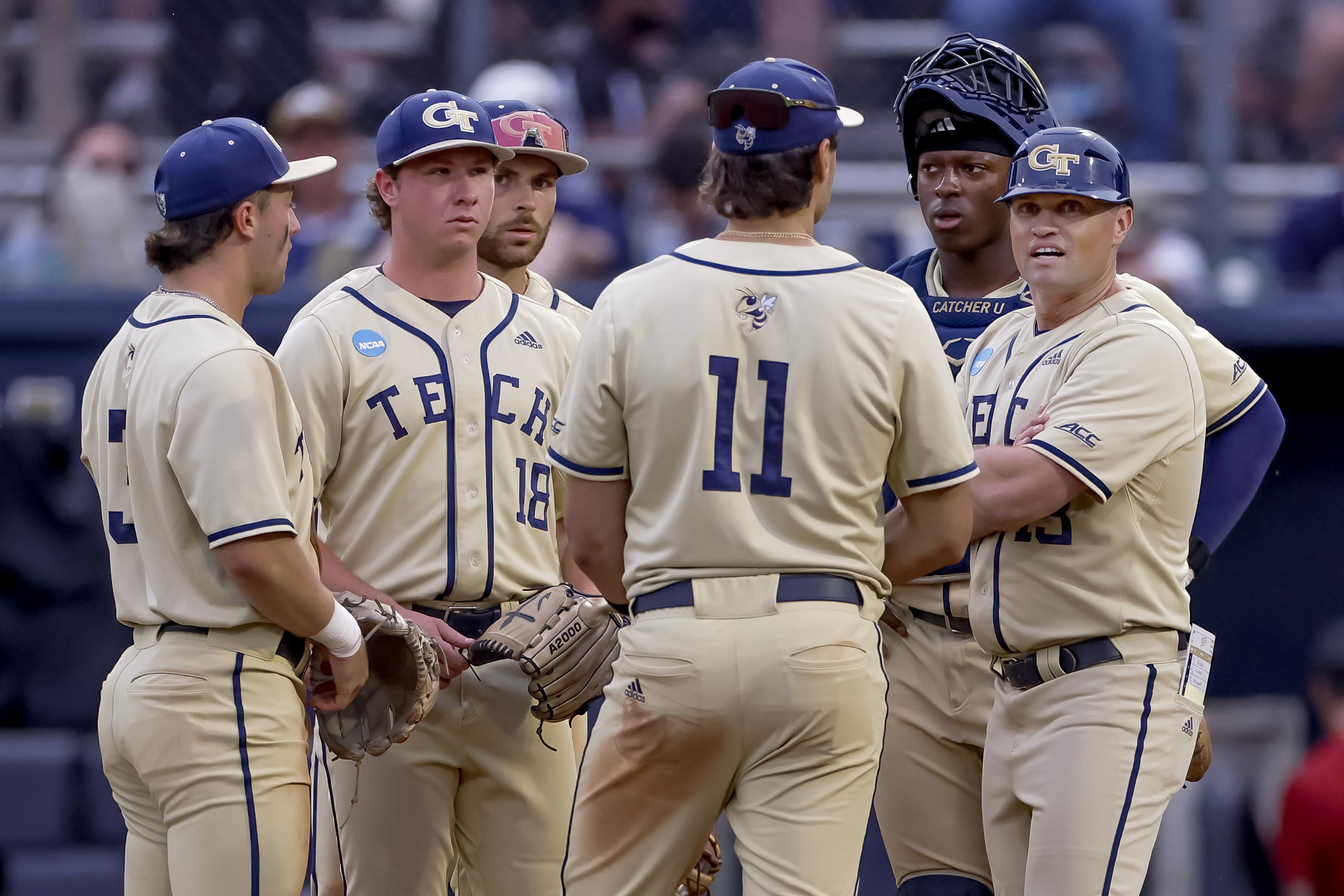 Georgia Tech head coach James Ramsey, right, makes a pitching change against Oklahoma during the fourth inning of the Atlanta Regional game at Russ Chandler Stadium, Sunday, May 31, 2026, in Atlanta. The Yellow Jackets lost to the Sooners and will have to play on Monday, June 1. (Erik S. Lesser for the AJC)
