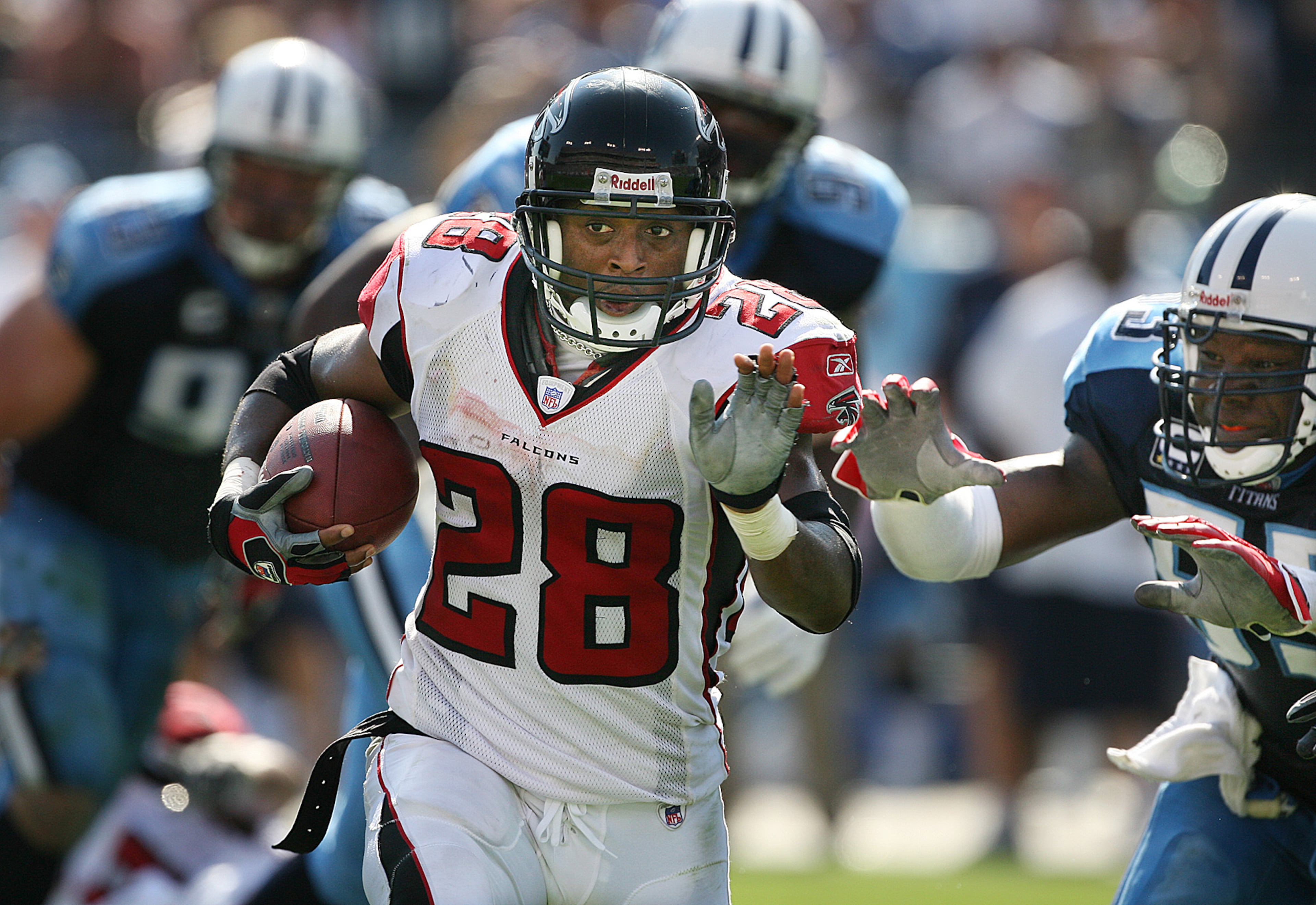 071007 NASHVILLE, TENN: Falcons running back #28 Warrick Dunn carries to the 1-yard line of the Titans during 4th quarter action, but the team was still not able to score a touchdown at LP Field in Nashville, Sunday, Oct. 7, 2007. CURTIS COMPTON / Staff