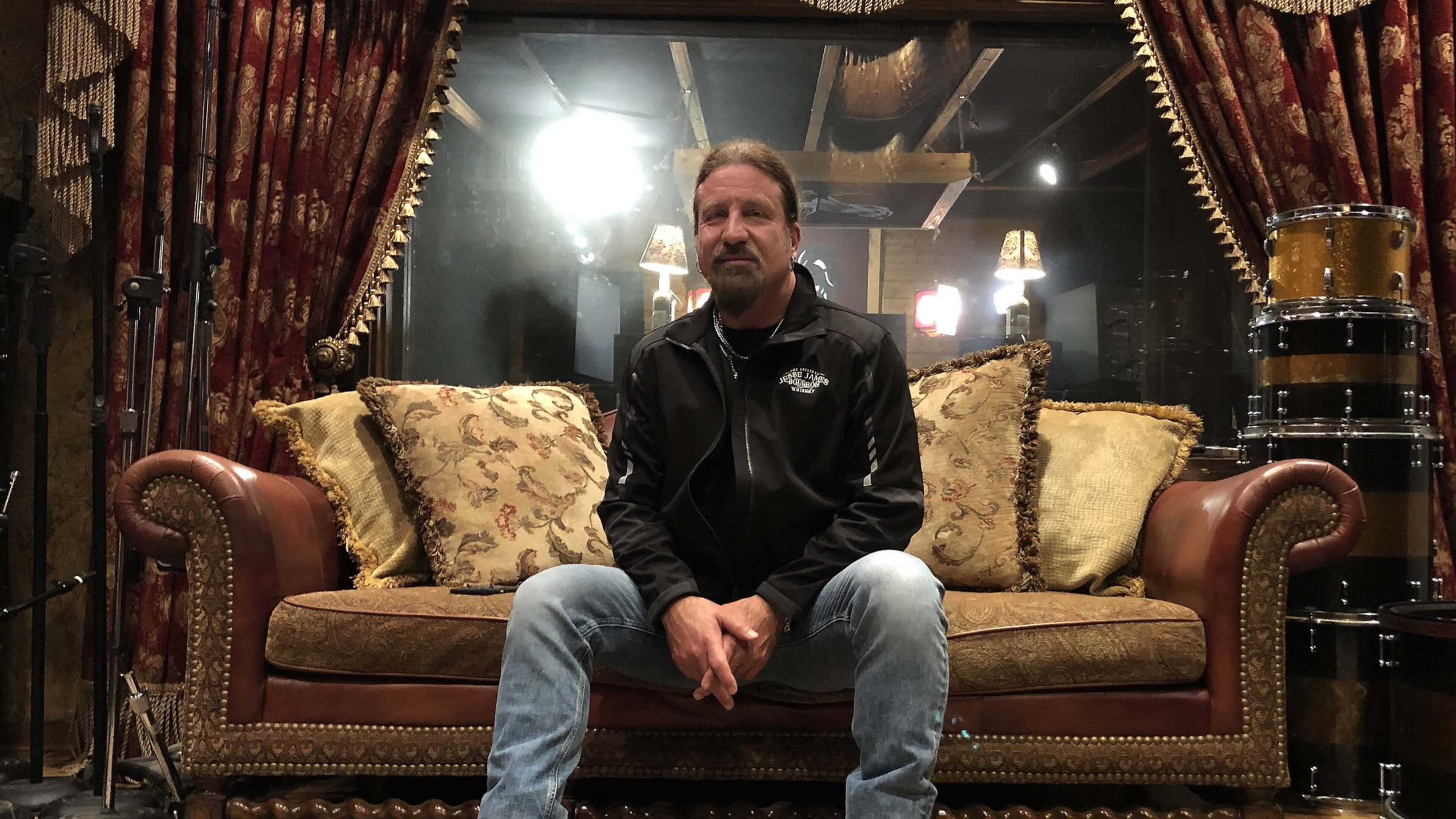 Jesse James Dupree, shown in his Kennesaw studio in Decemeber 2018, has recorded a tribute to the trucking industry. RYON HORNE / RHORNE@AJC.COM