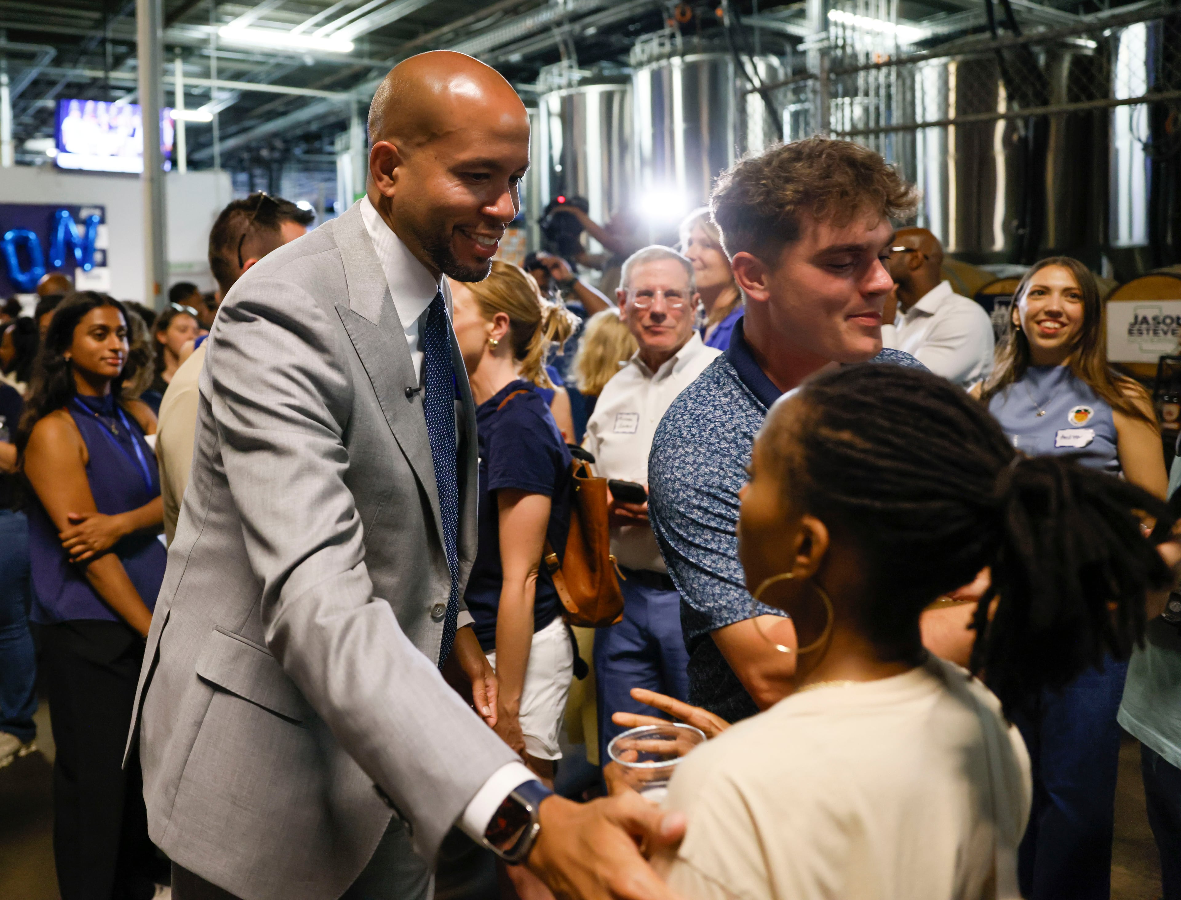 Jason Esteves greets supporters at his watch party for the governor's race at Scofflaw Brewing Co., in Atlanta on Tuesday, May 19, 2026, during the 2026 Georgia primary elections.(Bob Andres for the AJC)