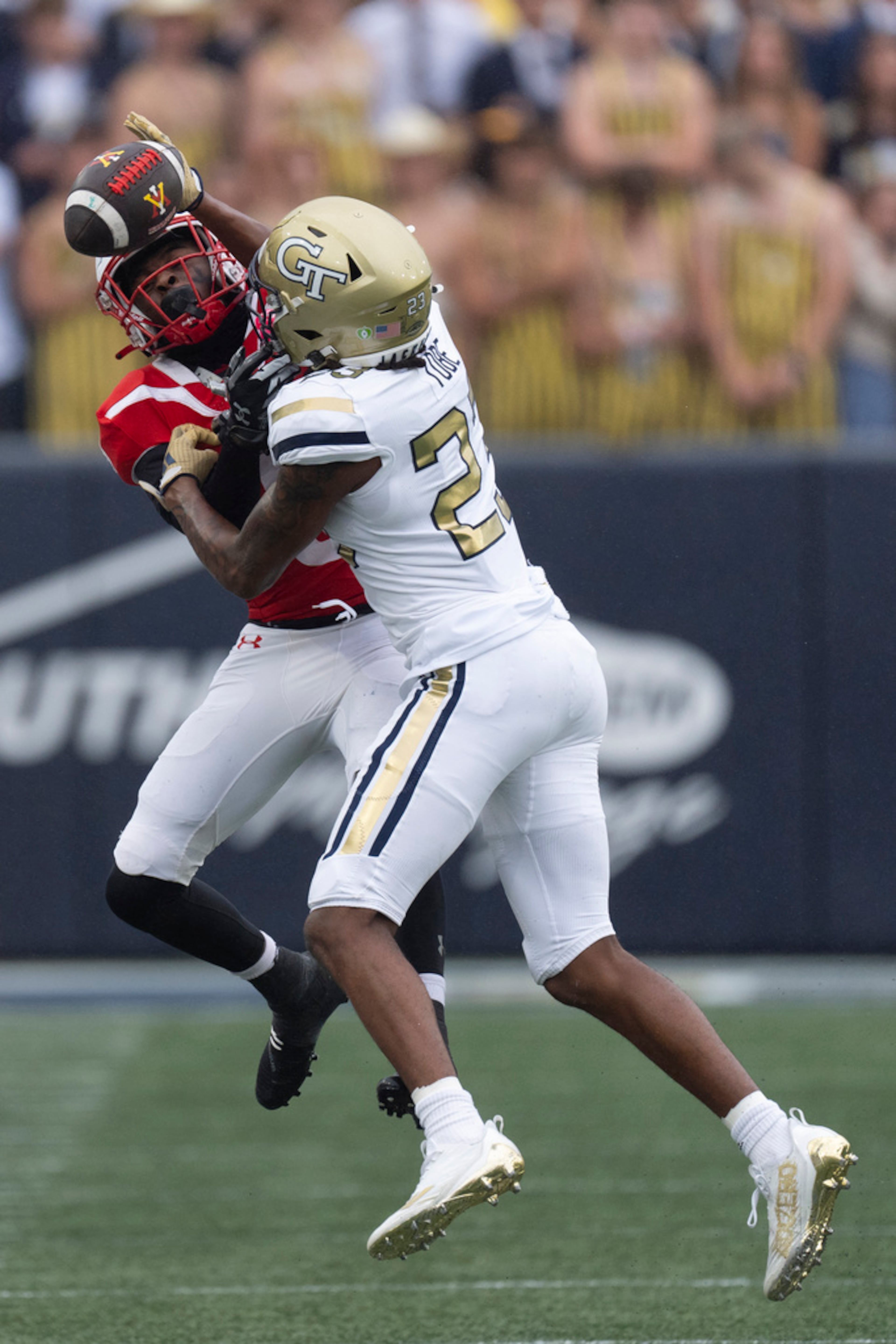 Georgia Tech defensive back Zachary Tobe (23) breaks up a pass intended for Virginia Military Institute wide receiver Julio DaSilva (9) during the first half of a NCAA college football game Saturday, Sept. 14, 2024, in Atlanta,. (AP Photo/John Bazemore)