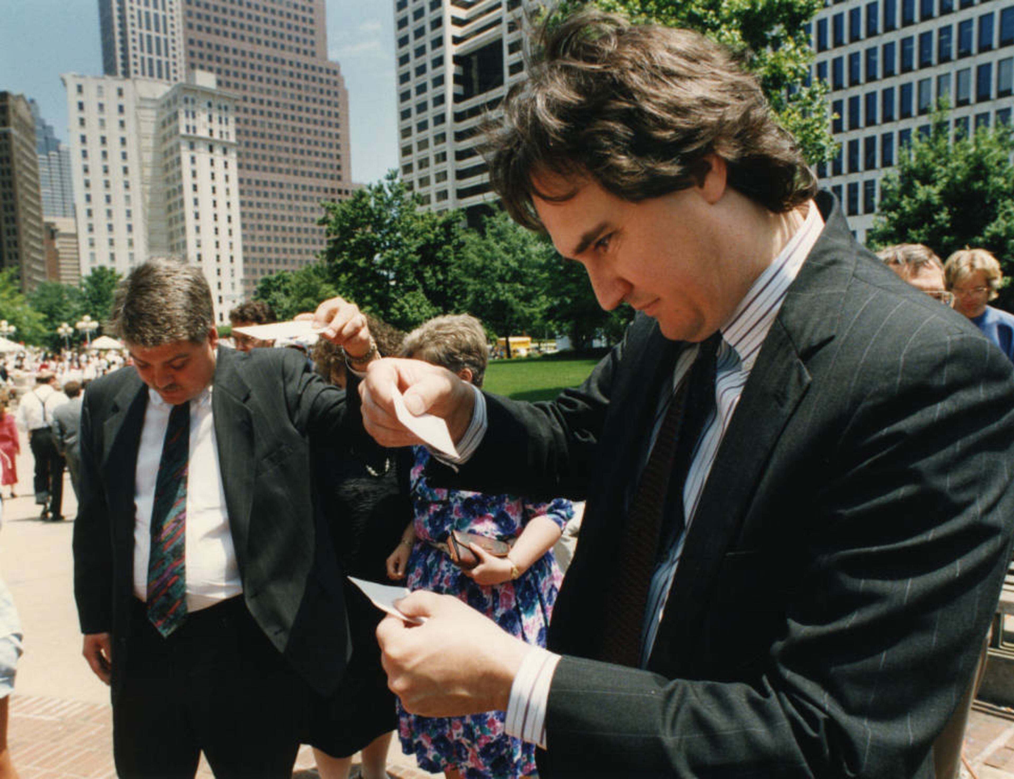Crowds gather in Woodruff Park to watch the solar eclipse with Georgia State University astronomers, May 1994.