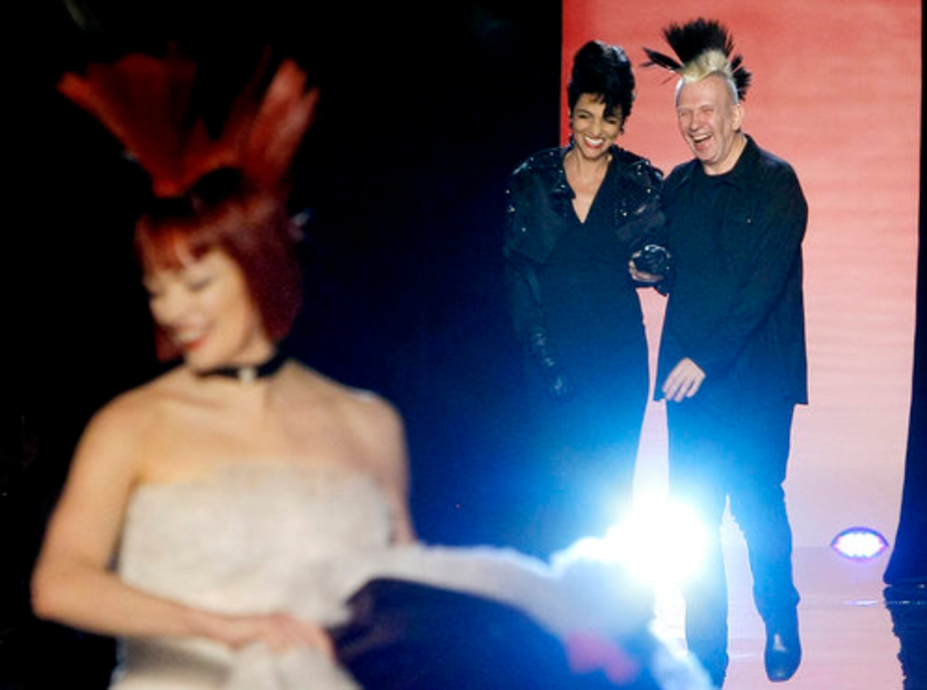 Model Farida Khelfa, Gaultier's muse, and the designer appear on stage at the end of the show.