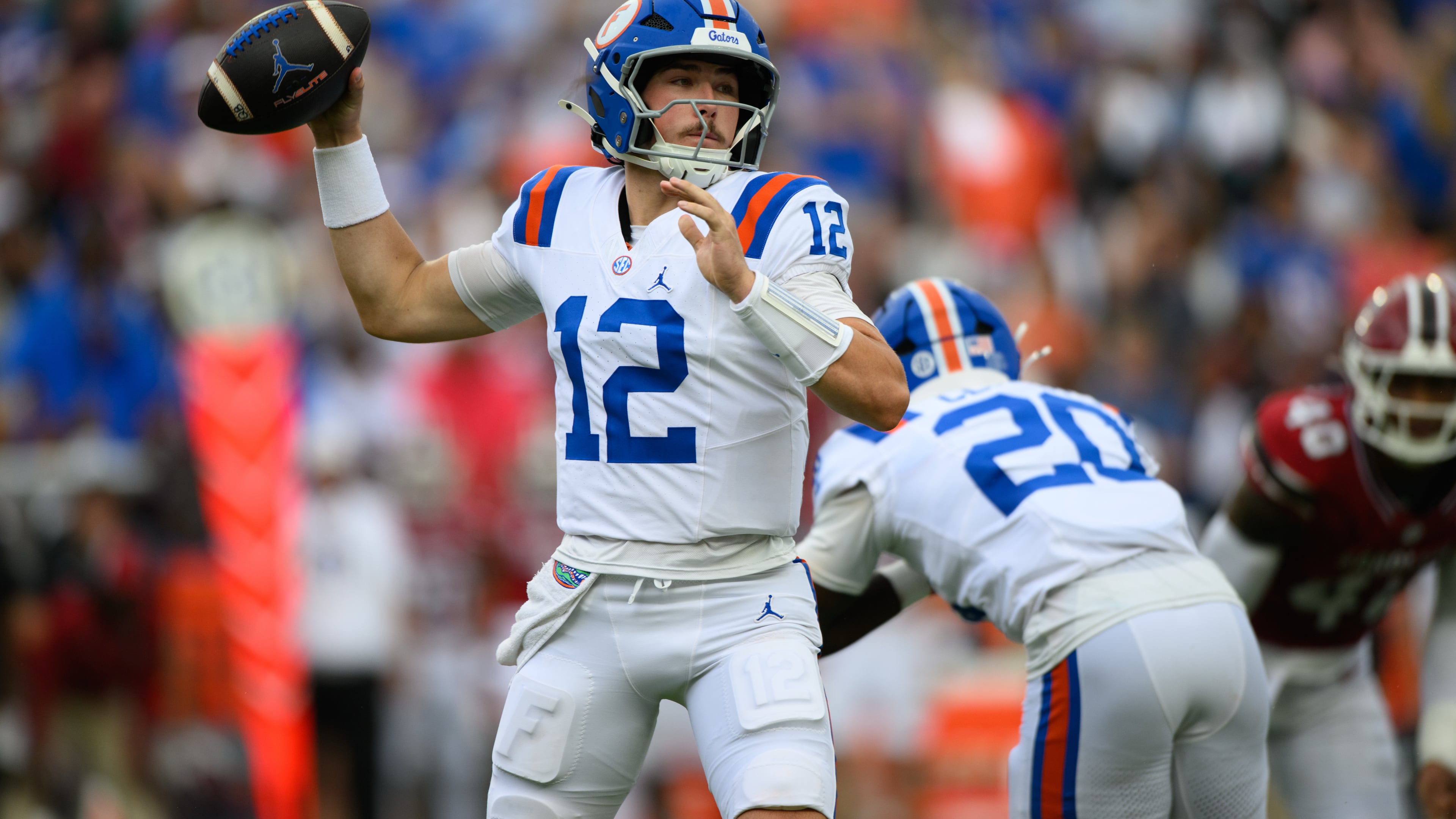 Florida quarterback Aaron Philo (12) throws during the first half of an NCAA college football game against South Carolina, Saturday, Oct. 10, 2026, in Gainesville, Fla. (AP Photo/Noah Lantor)
