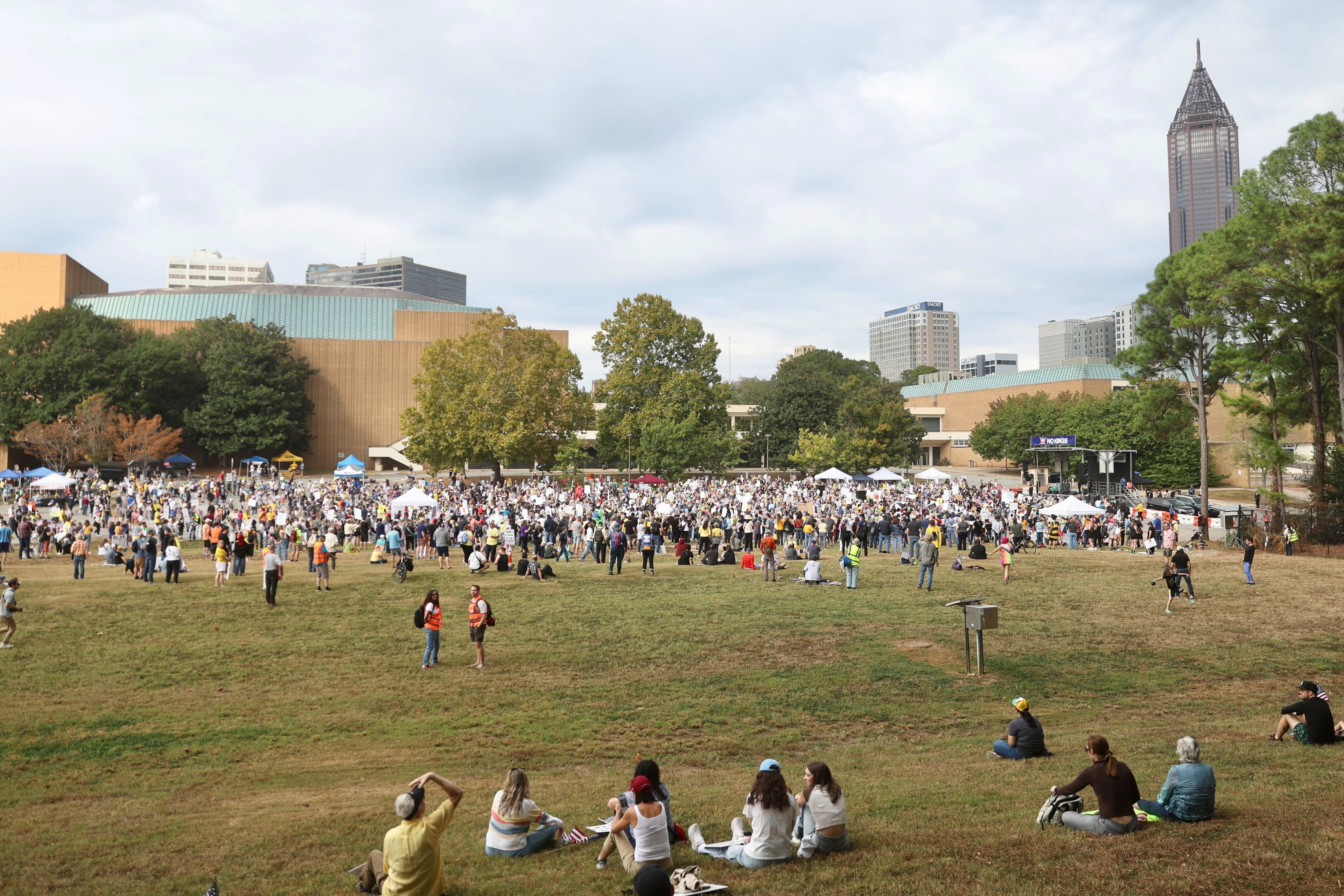 Thousands of people gathered at the Atlanta Civic Center parking lot Saturday morning for a "No Kings" protest. (Abbey Cutrer/AJC)