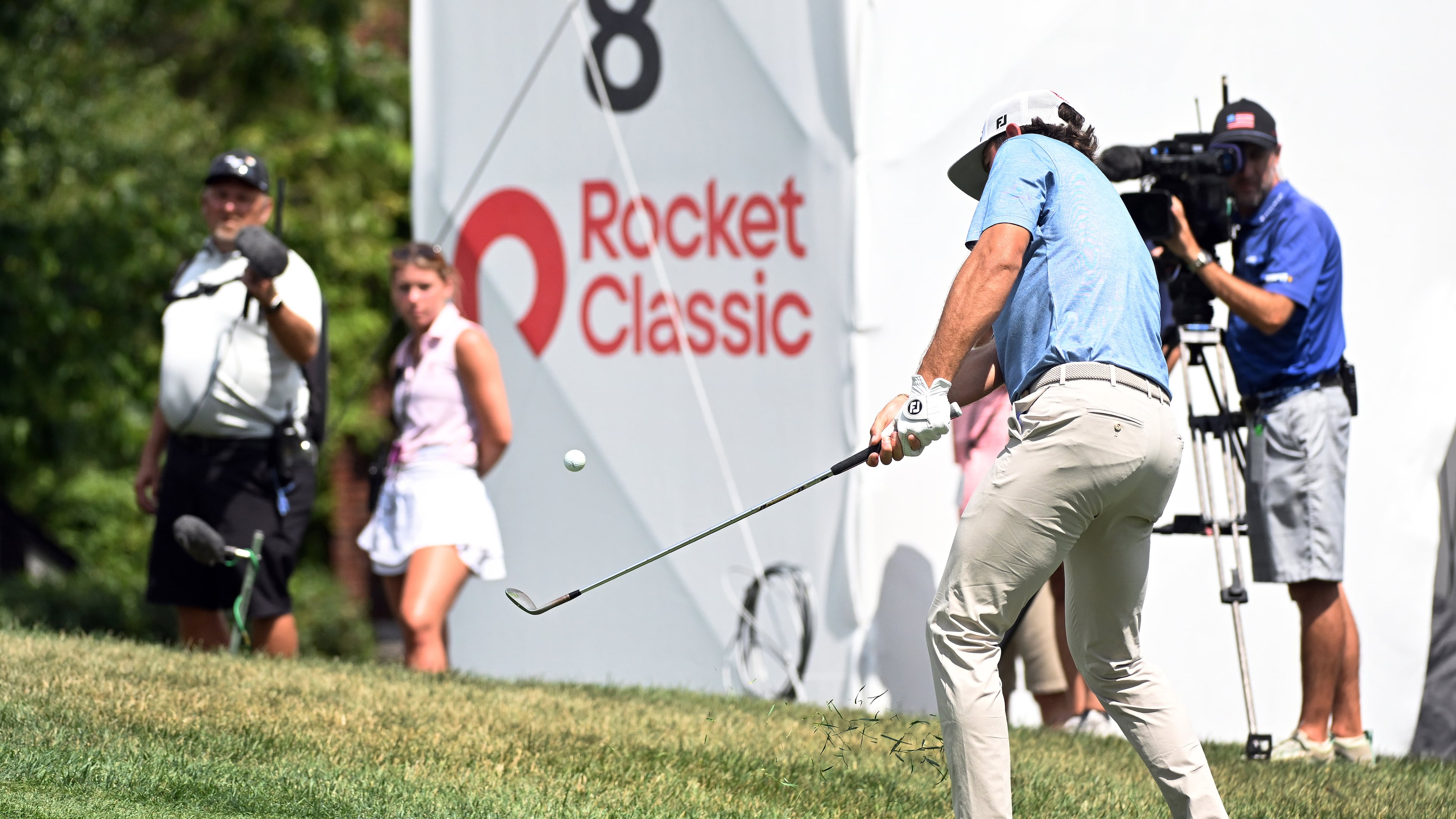Cameron Young chips onto the eighth green during the first round of the Rocket Classic golf tournament at the Detroit Golf Club, Thursday, July 30, 2026, in Detroit. (AP Photo/Jose Juarez)