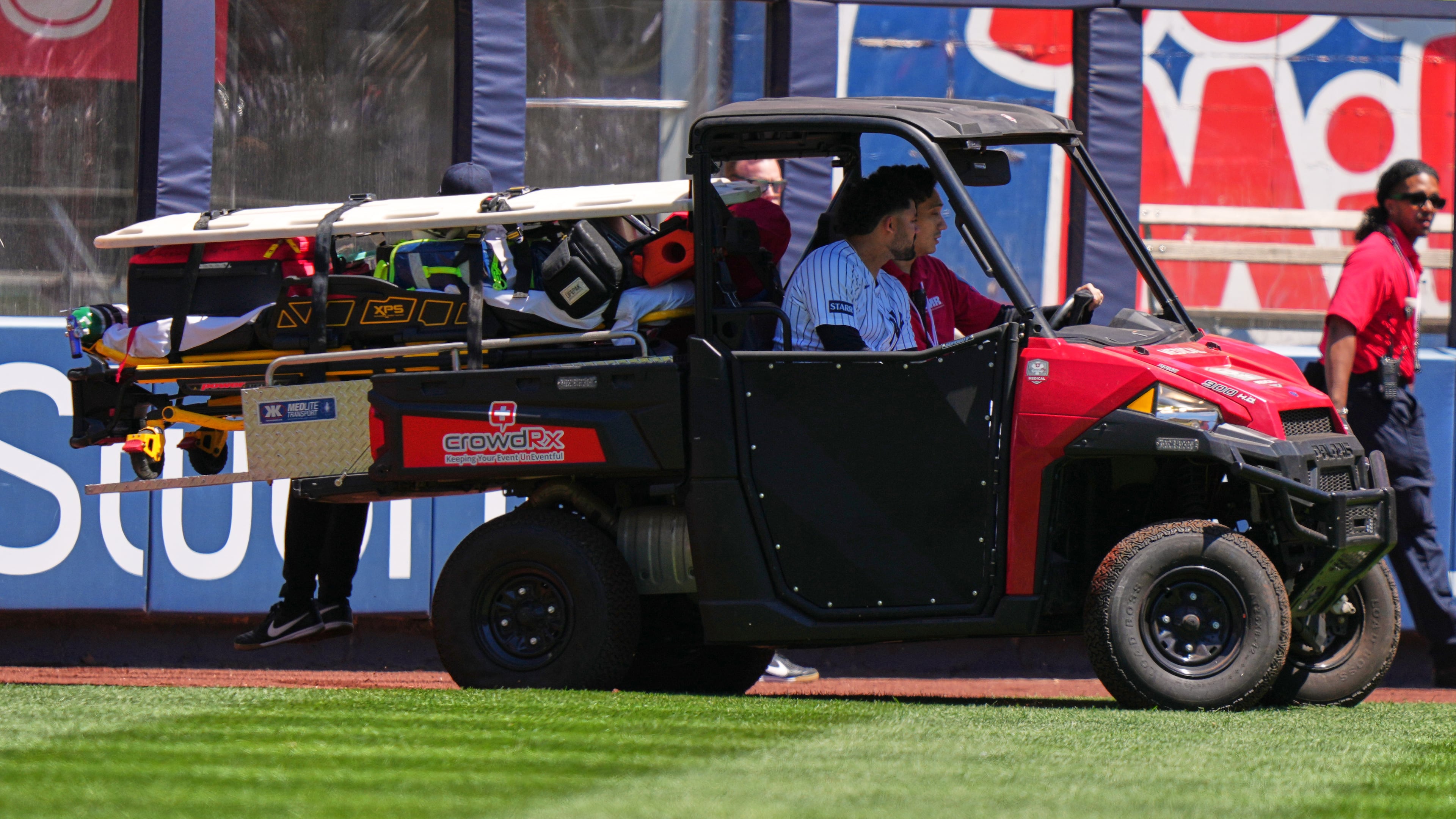 New York Yankees' Jasson Domínguez is carted off the field after an injury during the first inning of a baseball game against the Texas Rangers Thursday, May 7, 2026, in New York. (AP Photo/Frank Franklin II)