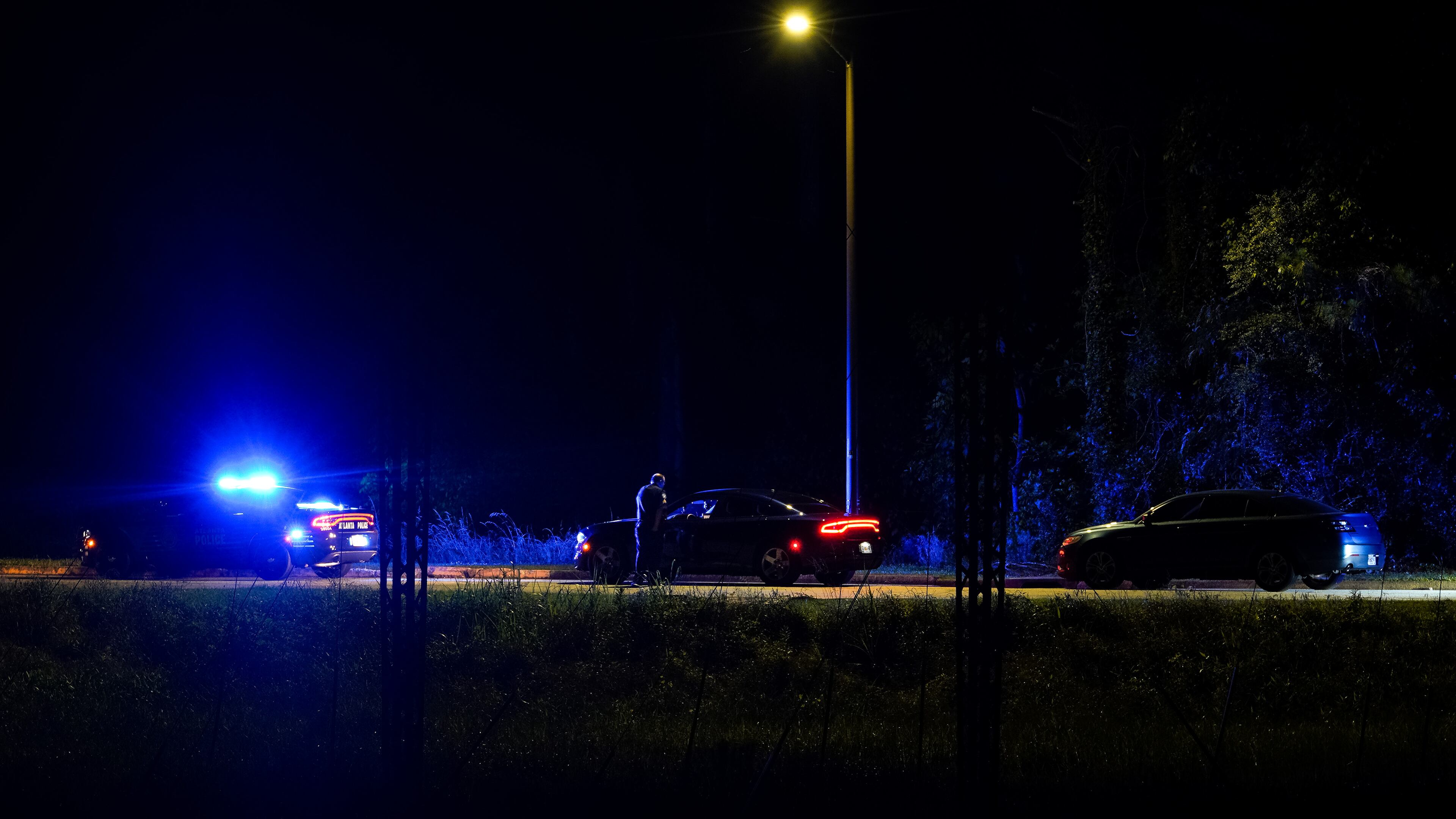 Atlanta police officers are investigating a shooting outside Benjamin E. Mays High School early Sunday. The gunfire was part of a violent Memorial Day weekend.