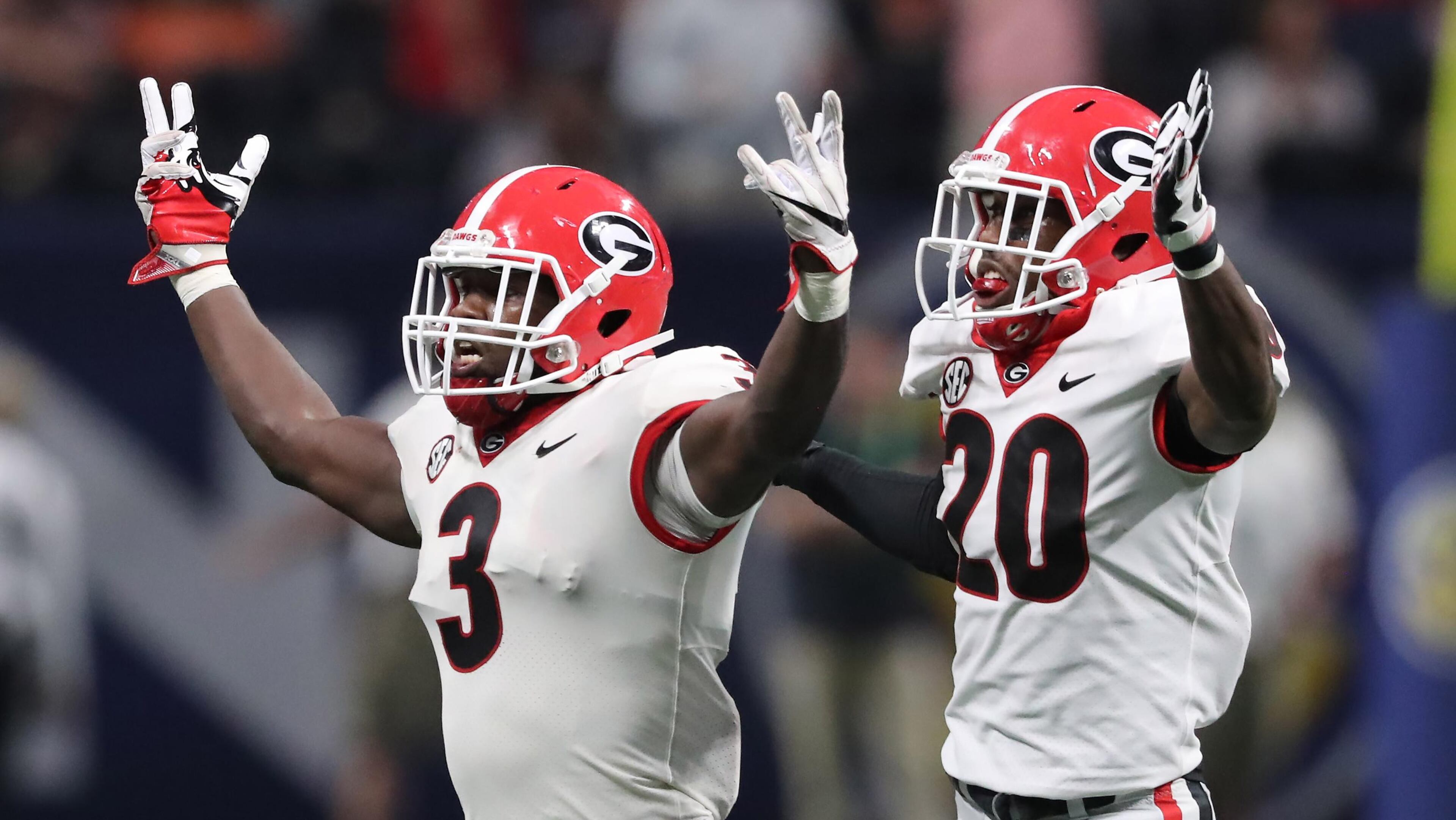 Georgia Bulldogs linebacker Roquan Smith (3) leads the defense in a celebration after recovering an Auburn Tigers fumble during the second half of the SEC Championship game Dec. 2, 2017, at Mercedes-Benz Stadium in Atlanta.
