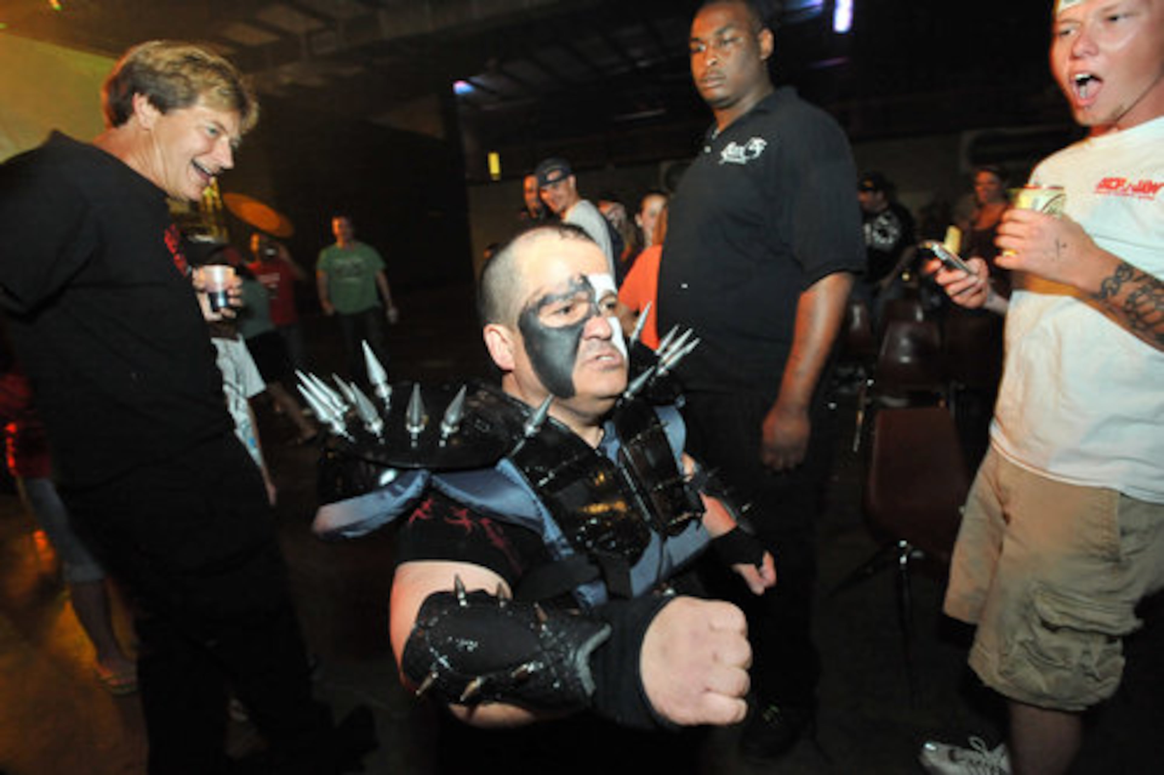 "Beast" Tim Arnett walks toward the ring in a special costume.