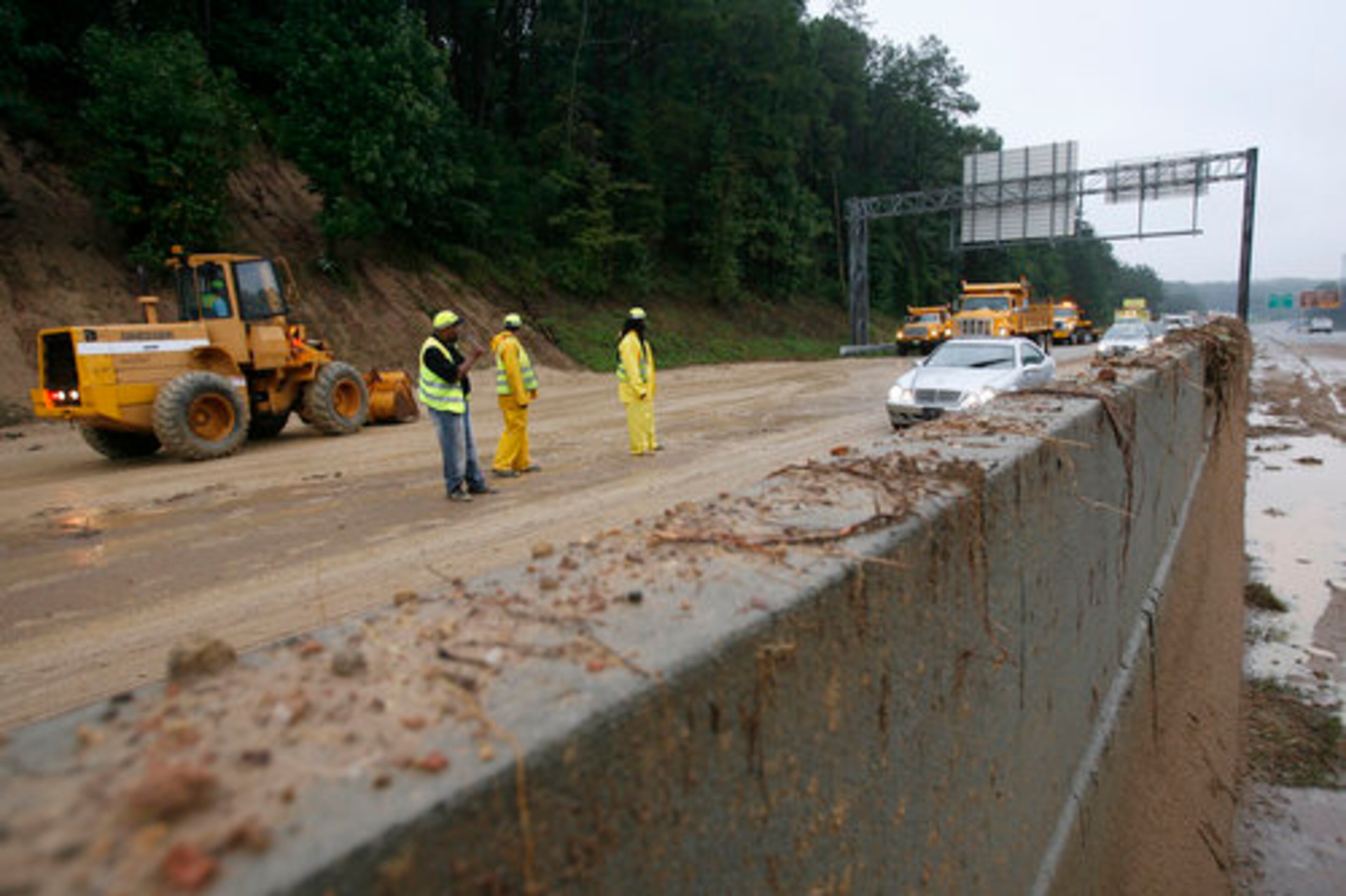 Torrential rains led to a mudslide across Ga. 78 near Hugh Howell Road on Monday morning.