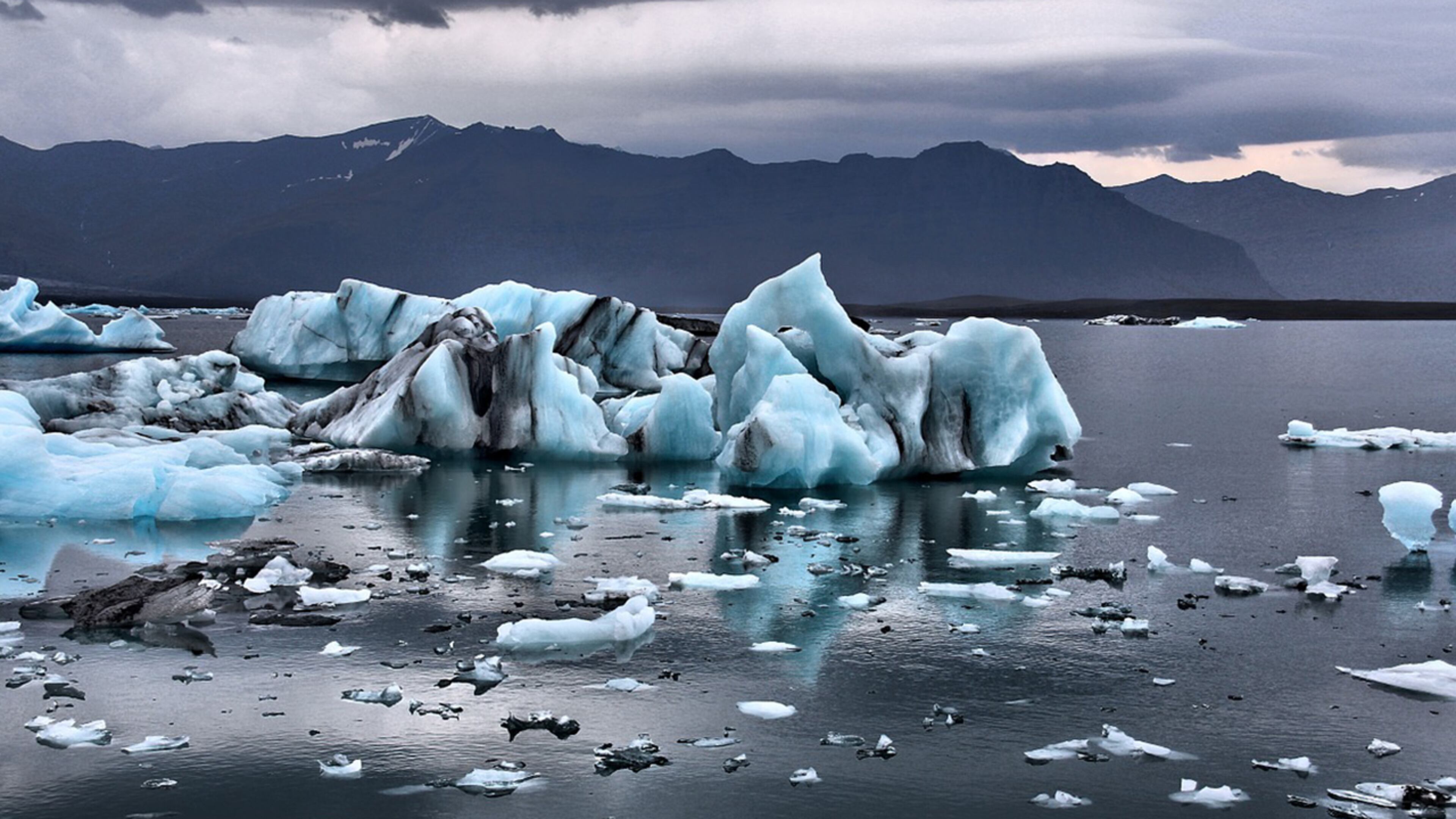 Pieces of blue glacial ice are pictured here. A chunk, similar to one these pieces, broke off a glacier in Iceland, sending tourists running for higher ground. No one was injured.