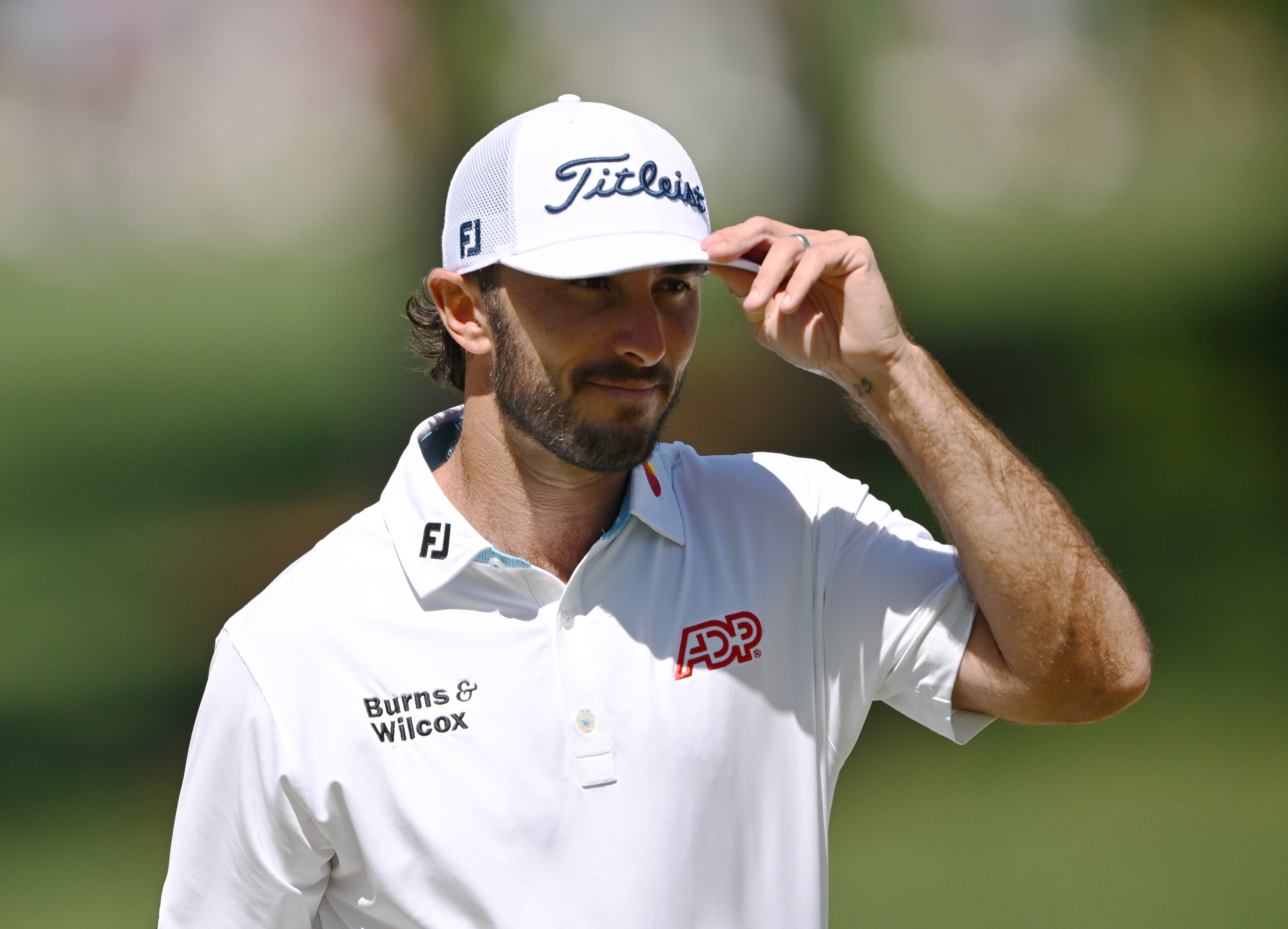 Max Homa acknowledges patrons on seventh hole during second round of the 2024 Masters Tournament at Augusta National Golf Club, Friday, April 12, 2024, in Augusta, Ga. (Hyosub Shin / Hyosub.Shin@ajc.com)