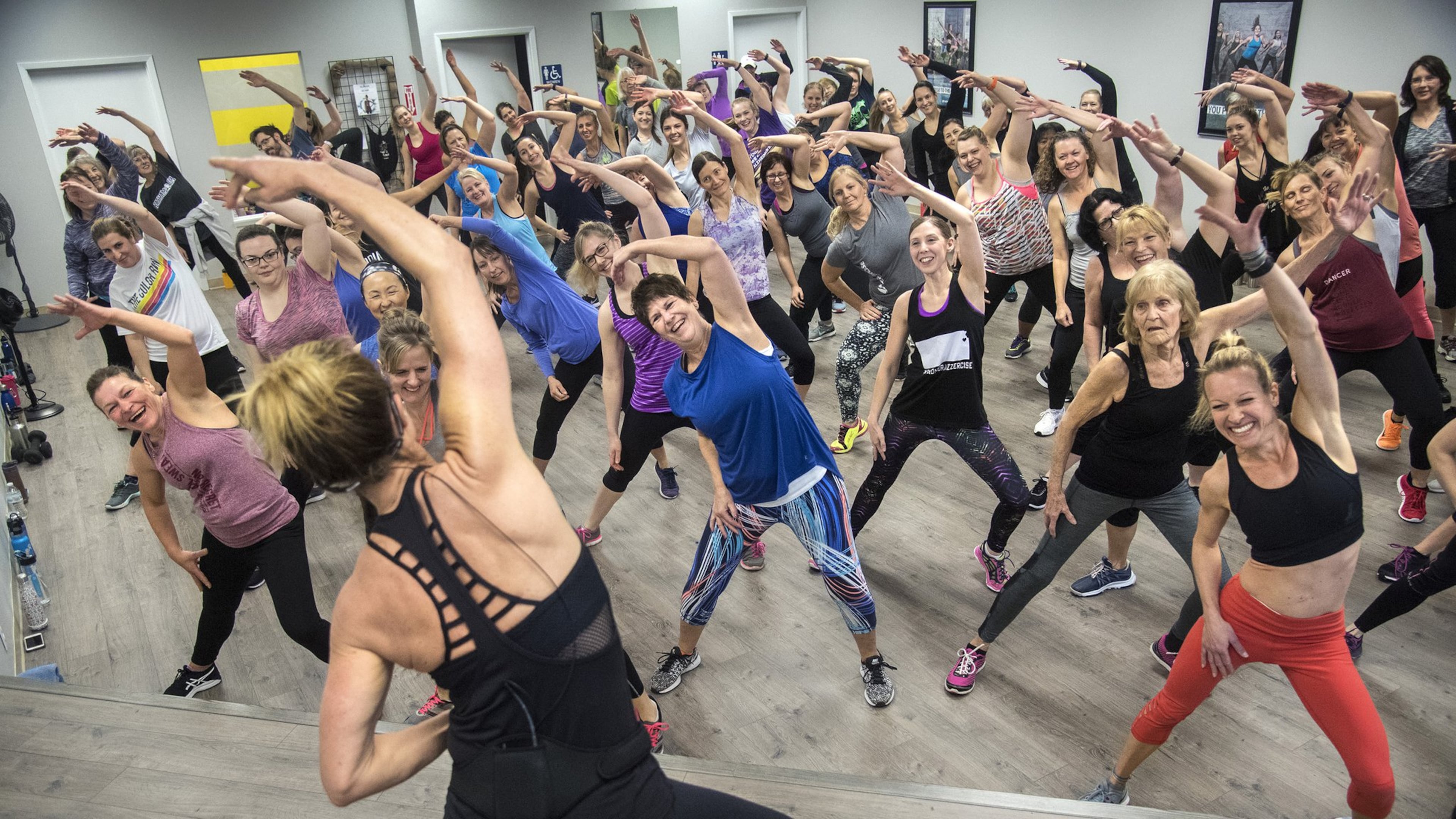 Jazzercise president Shanna Missett Nelson, daughter of the CEO and founder, teaches a Saturday, Jan. 20, 2018, to a standing-room-only class at a newly opened center on the South Hill at 2727 S. Mt Vernon, in Spokane, Wash. (Dan Pelle/The Spokesman-Review/TNS)
