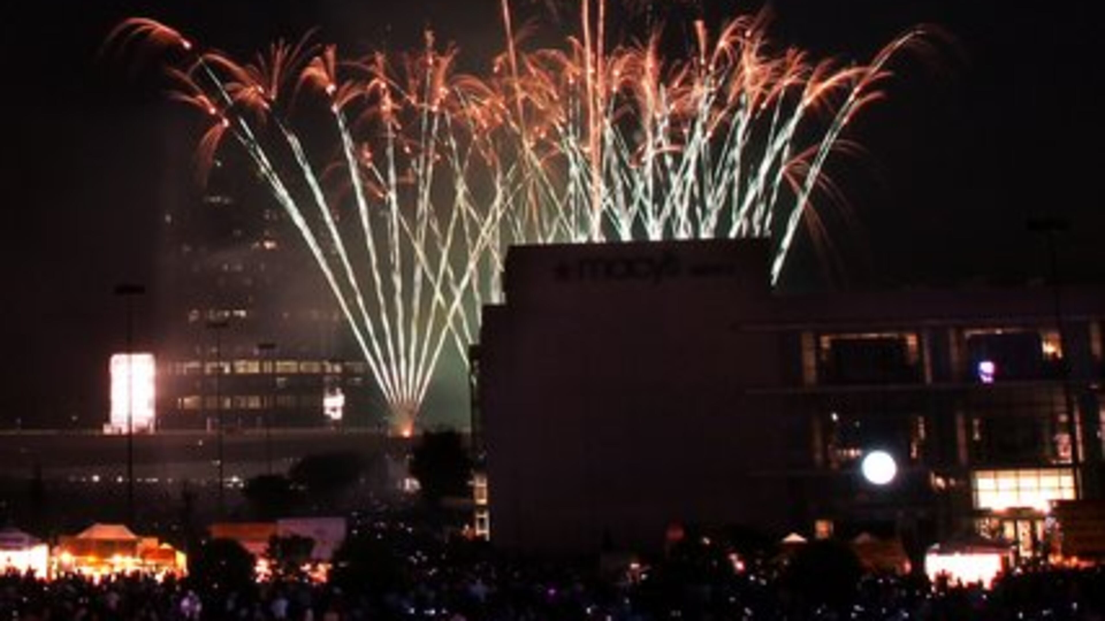 100704 Atlanta - Fireworks light up the sky over the Macy's building during the Legendary 4th fireworks celebration at Lenox Square on Sunday, July 4, 2010. Curtis Compton ccompton@ajc.com