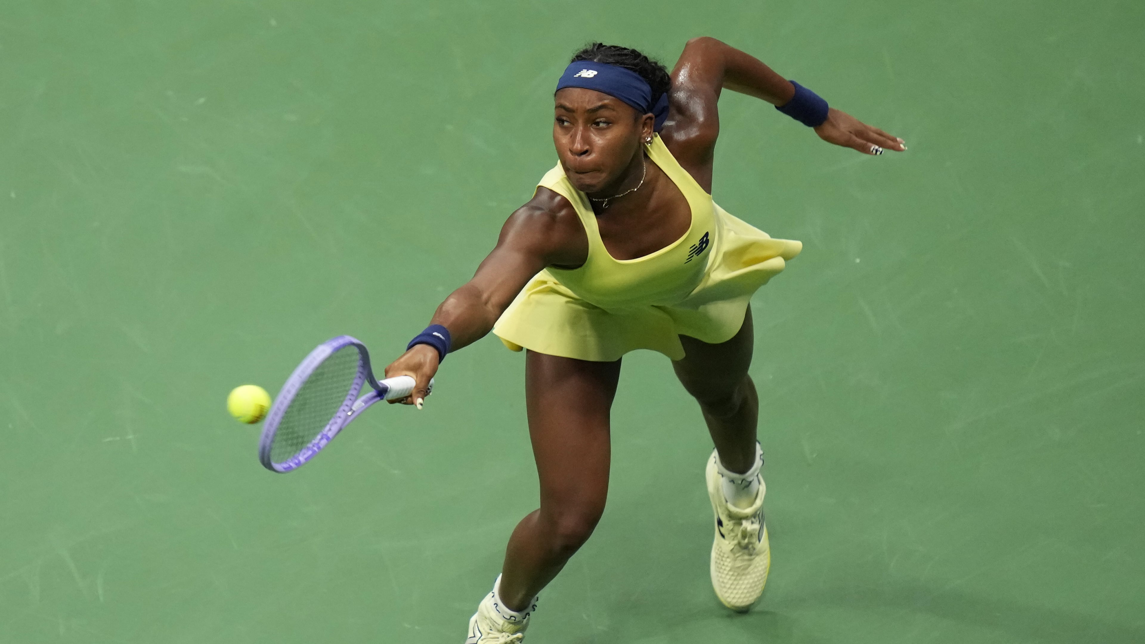 Coco Gauff, of the United States, returns the ball to Elena Rybakina, of Kazakhstan, during the women's singles semifinals of the U.S. Open tennis championships Thursday, Sept. 10, 2026, in New York. (AP Photo/Kirsty Wigglesworth)