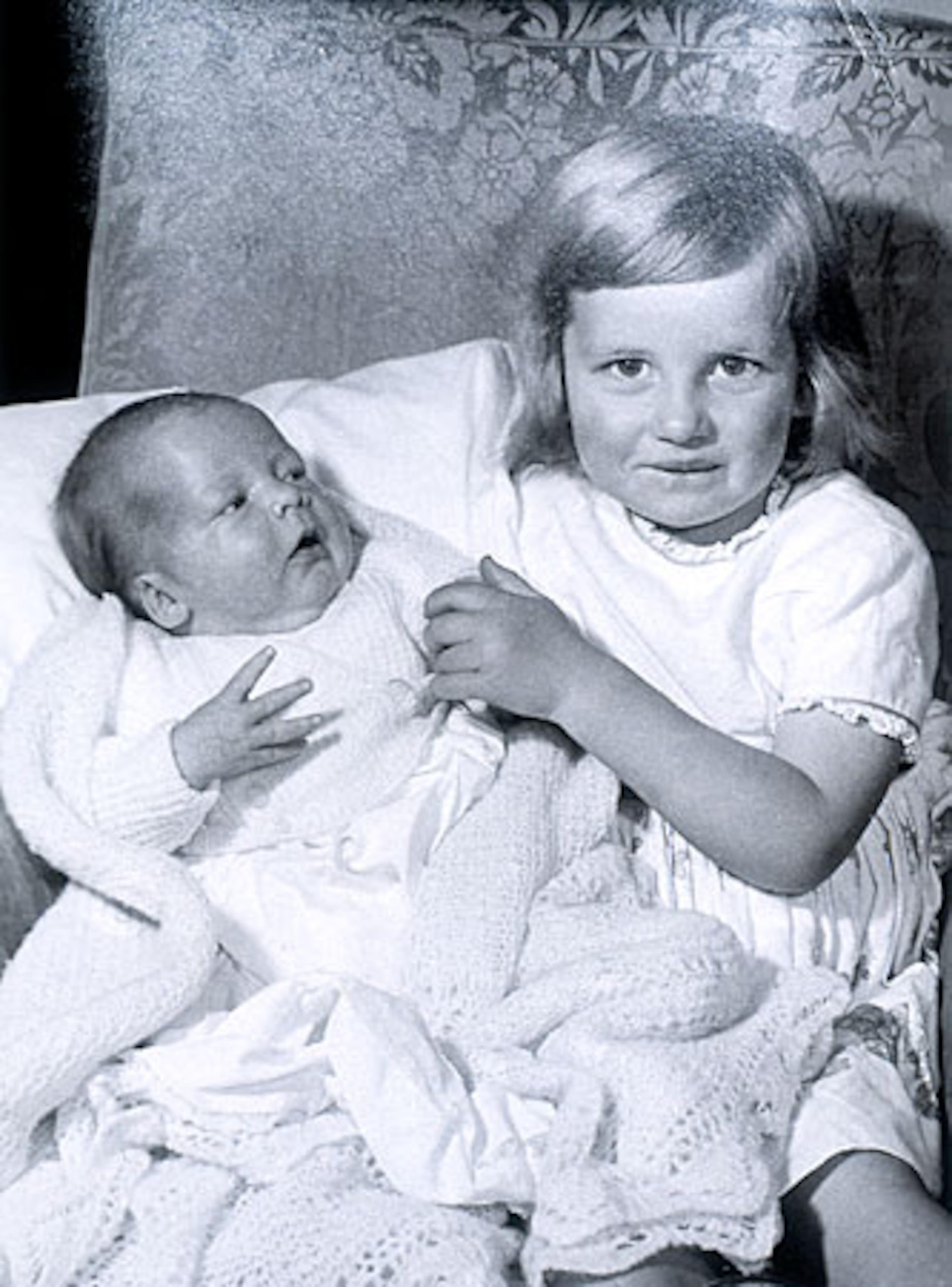 An exhibit about Diana, shown with 8-month-old Charles Spencer, documents her transformation through the years. Althorp Estate