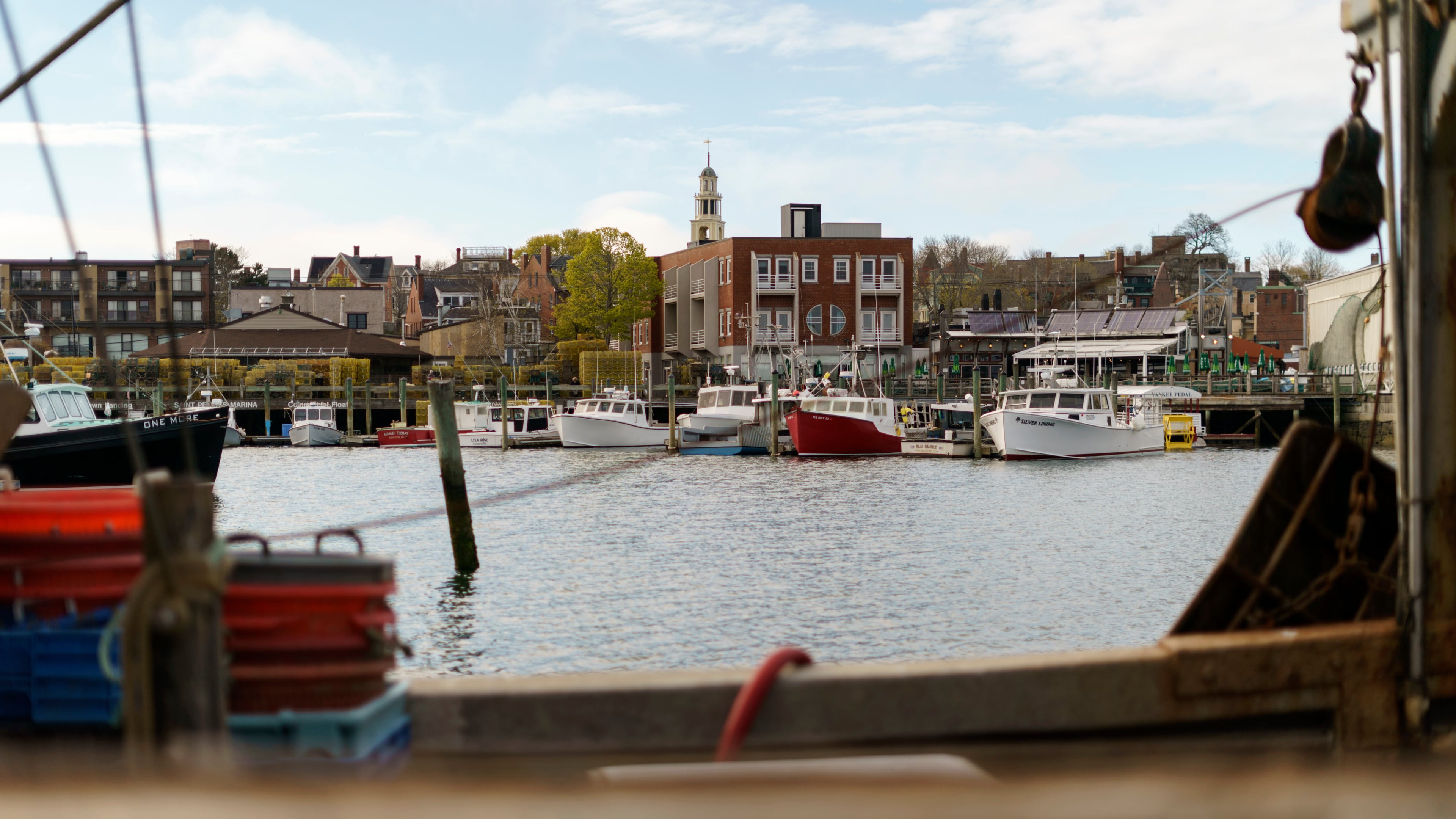 FILE - Fishing boats are docked in the harbor of Gloucester, Mass., May 11, 2022. (AP Photo/David Goldman, File)