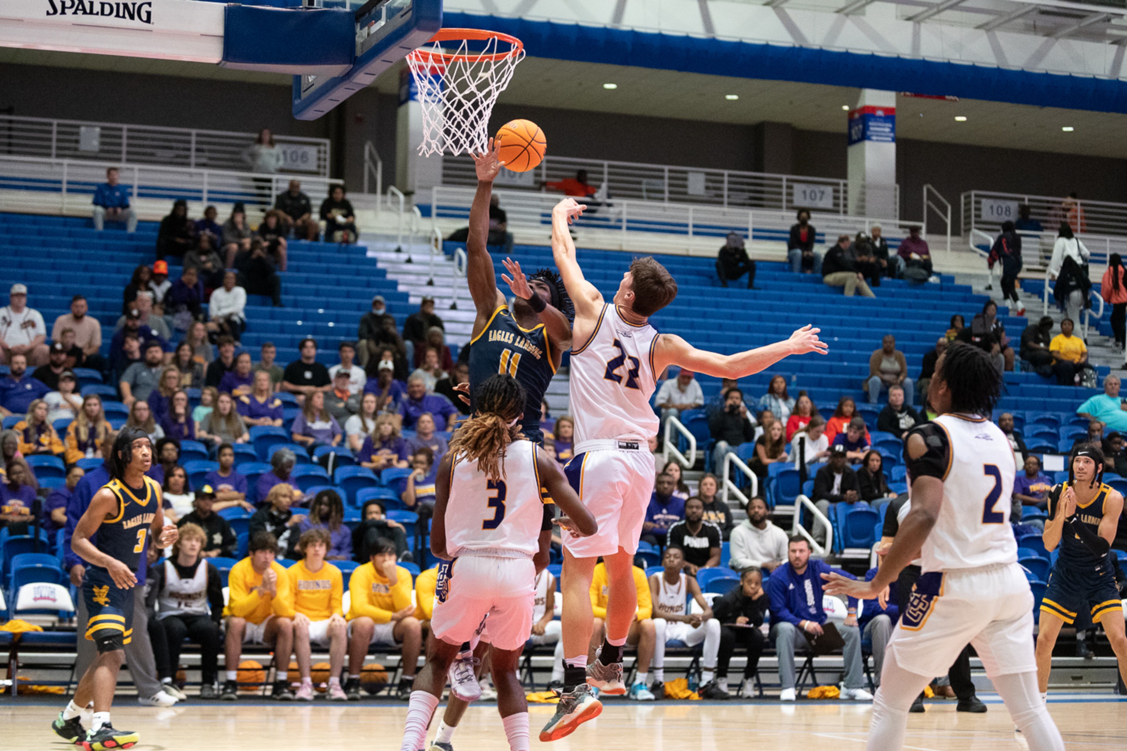 Eagles Landing's Chris Morris gets a shot blocked. Jamie Spaar for the Atlanta Journal-Constitution