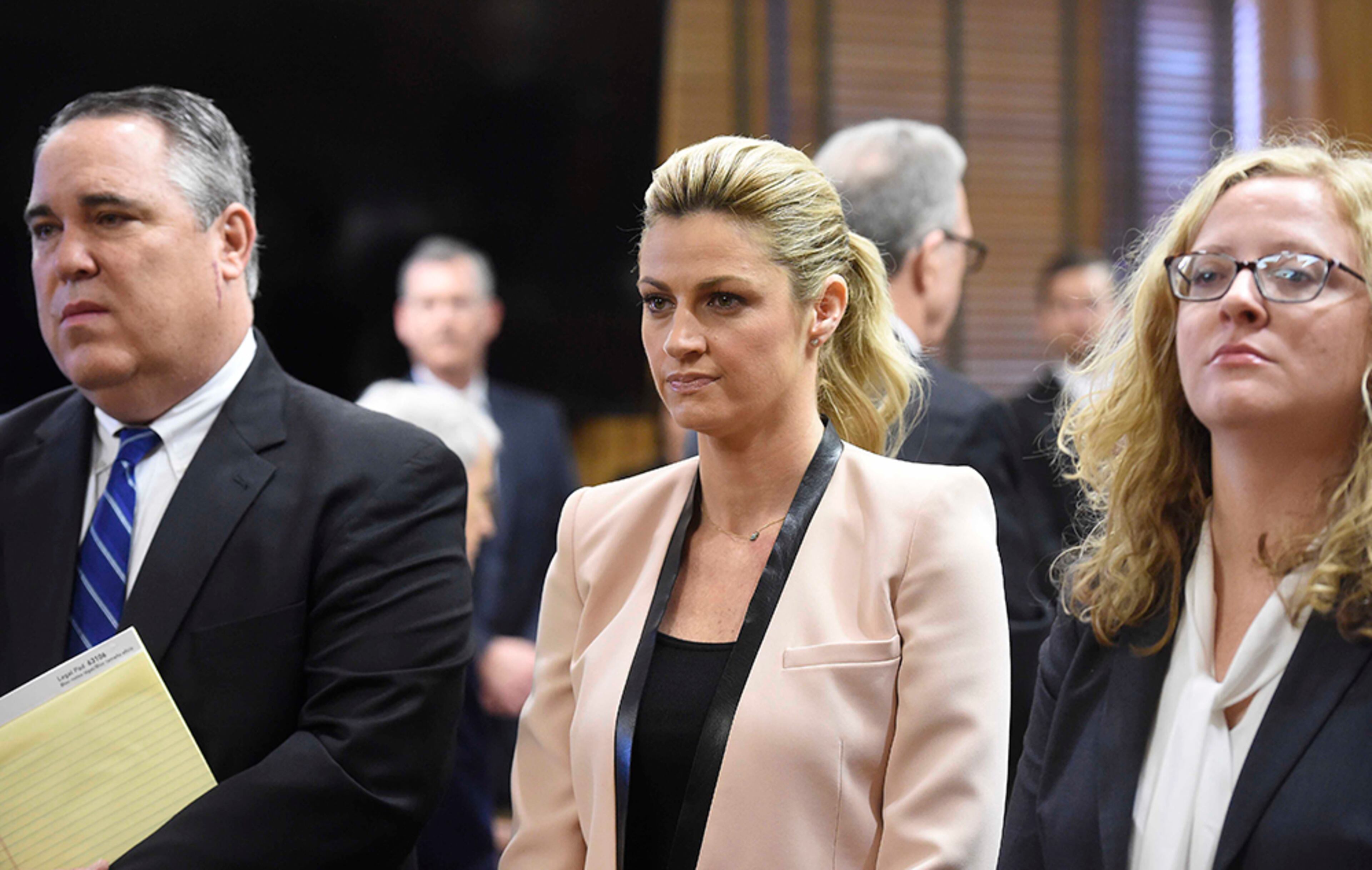 Sportscaster and TV host Erin Andrews (center) is in a Tennessee courtroom this week over a $75 million lawsuit she originally filed in 2011 against the franchise owner and manager of a luxury hotel and a man who admitted to making secret nude recordings of her in 2008 when she worked for ESPN.