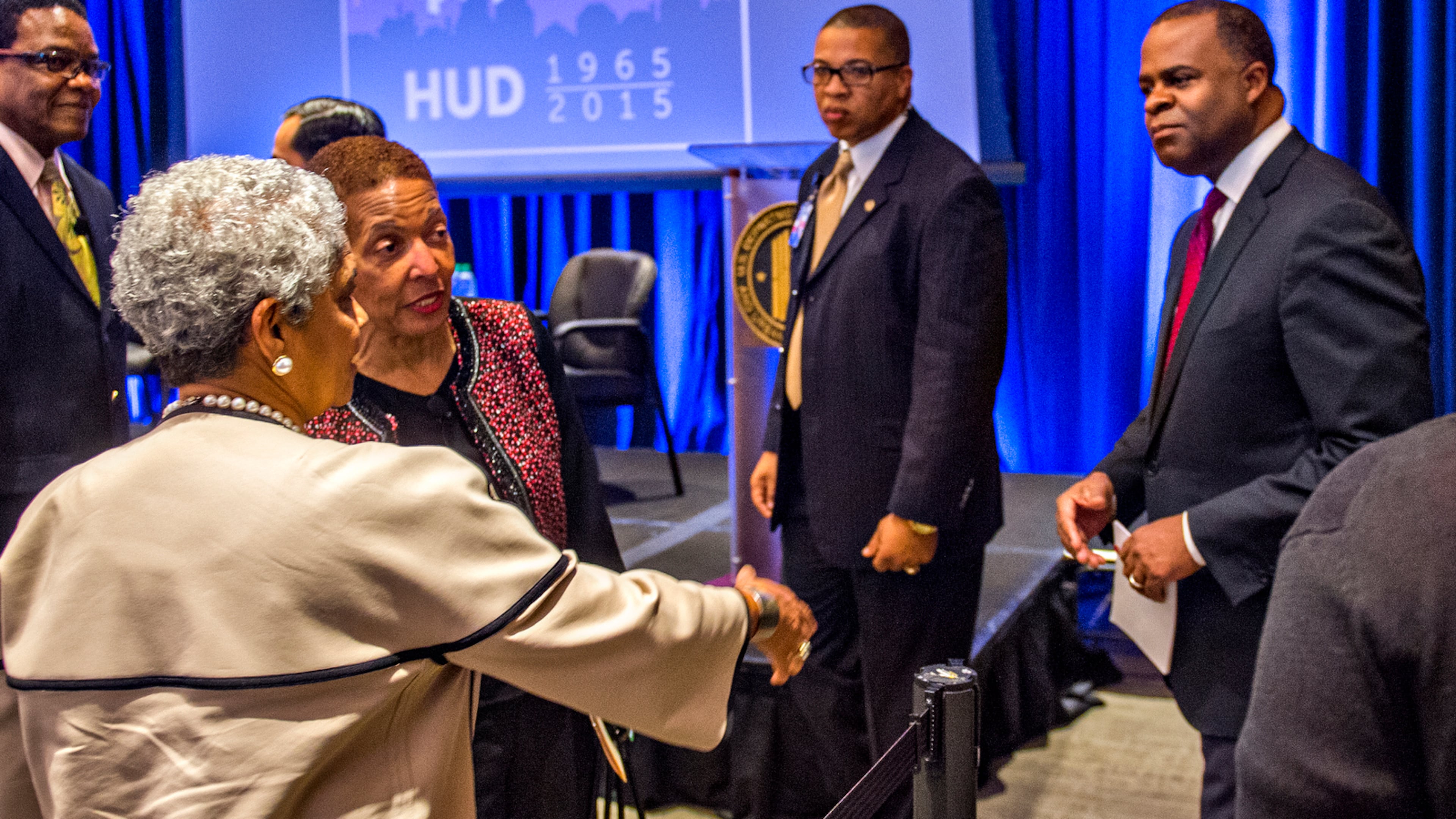 Former Atlanta Housing Authority Executive Director Renee Glover (center) — pictured with former Atlanta mayors Kasim Reed (right) and Shirley Franklin in 2015 — created the "Atlanta Way" plan for improving the city's public housing and the lives of its residents. Glover worked for the AHA from 1994 to 2013. (Jonathan Phillips/Special to the AJC 2015)