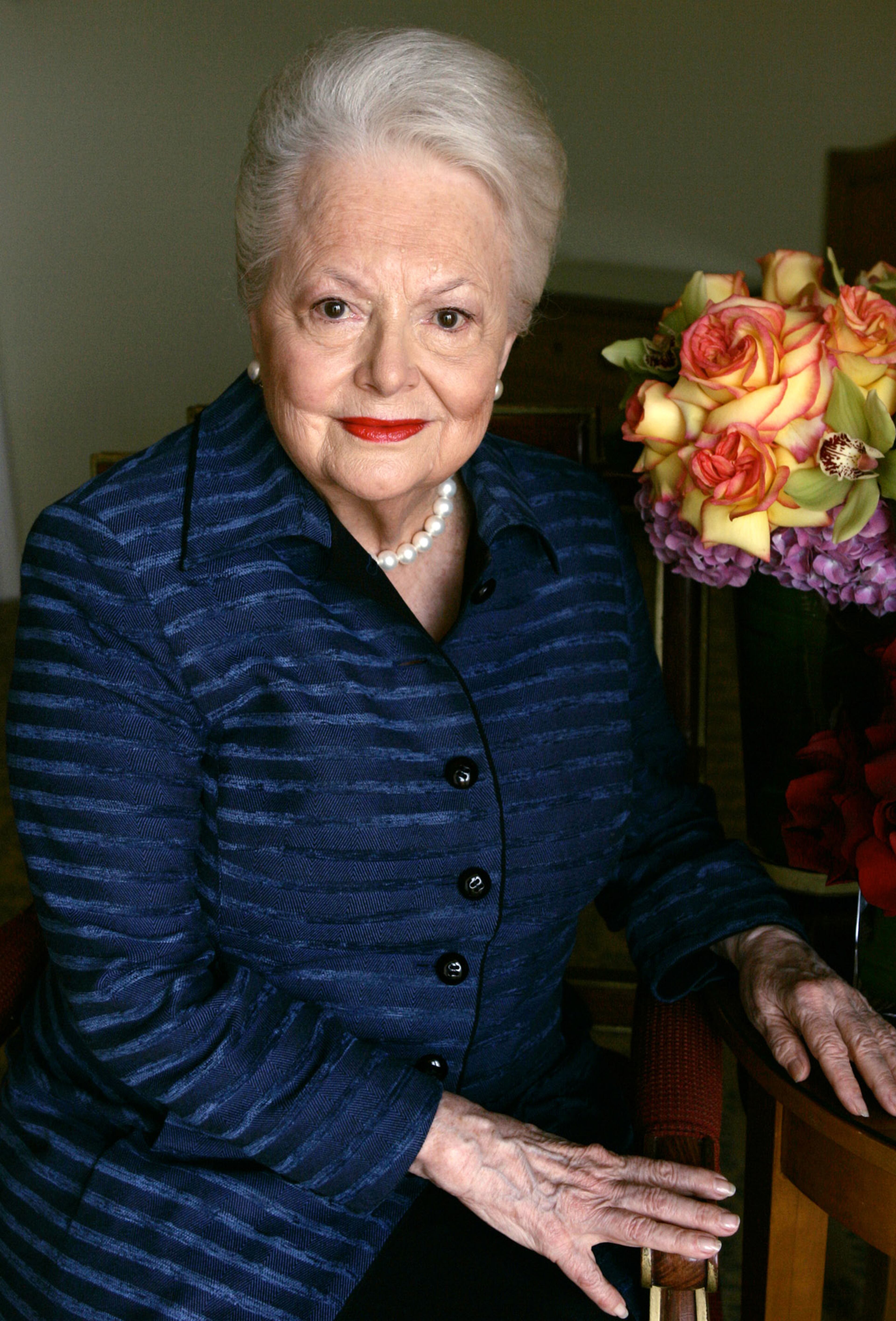 Actress Olivia de Havilland, who played the doomed Southern belle Melanie in "Gone With the Wind," poses for a photograph Wednesday, Sept. 15, 2004, in Los Angeles.