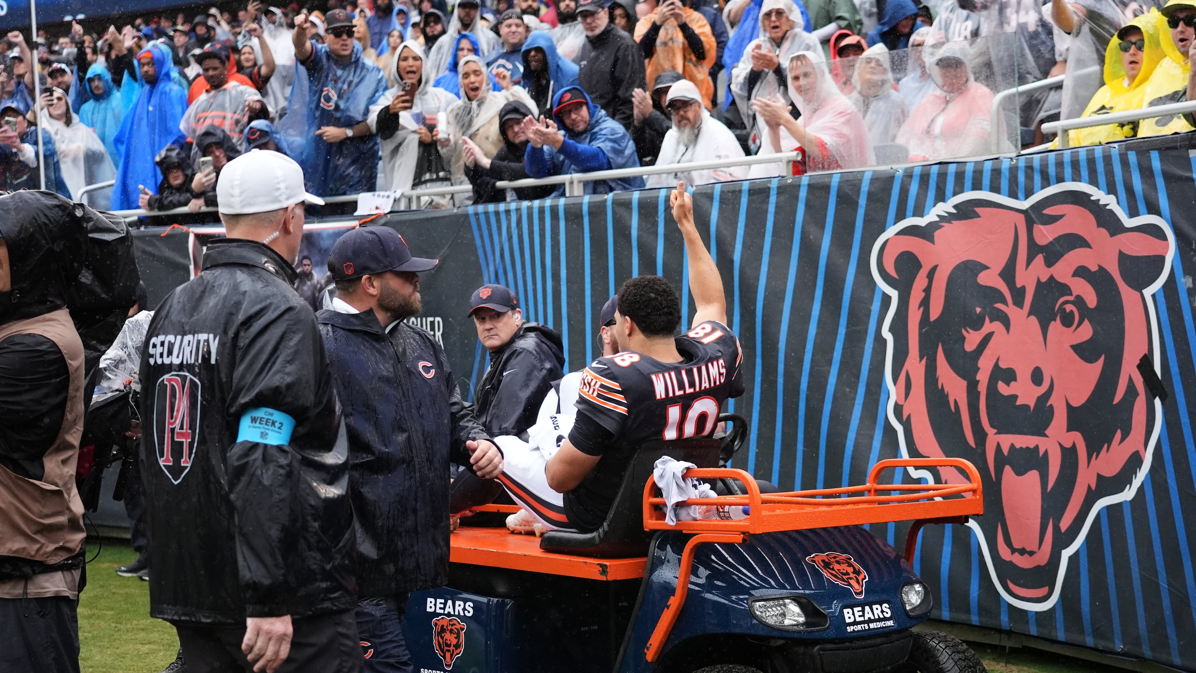 Chicago Bears quarterback Caleb Williams (18) waves as he is carted off the field after an injury during the second half of an NFL football game against the Minnesota Vikings in Chicago, Sunday, Sept. 20, 2026. (AP Photo/Nam Y. Huh)