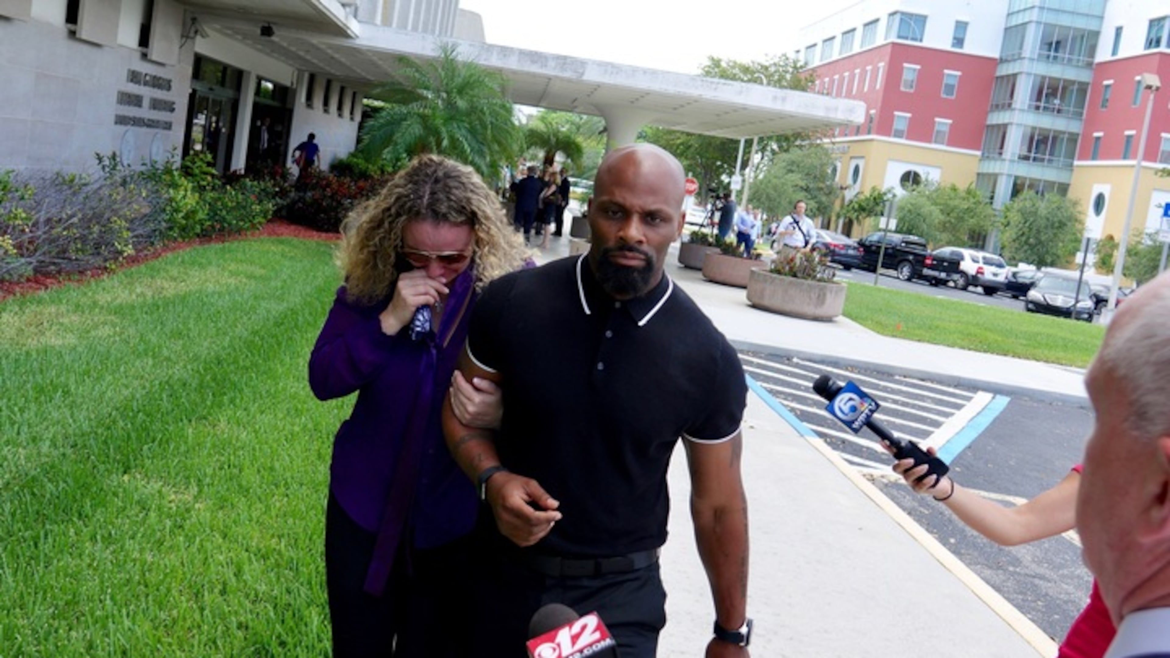 Laura Chatman walks out of the federal courthouse with family after sentencing with her husband Kenny Chatman in West Palm Beach on May 17, 2017. (Richard Graulich / The Palm Beach Post)
