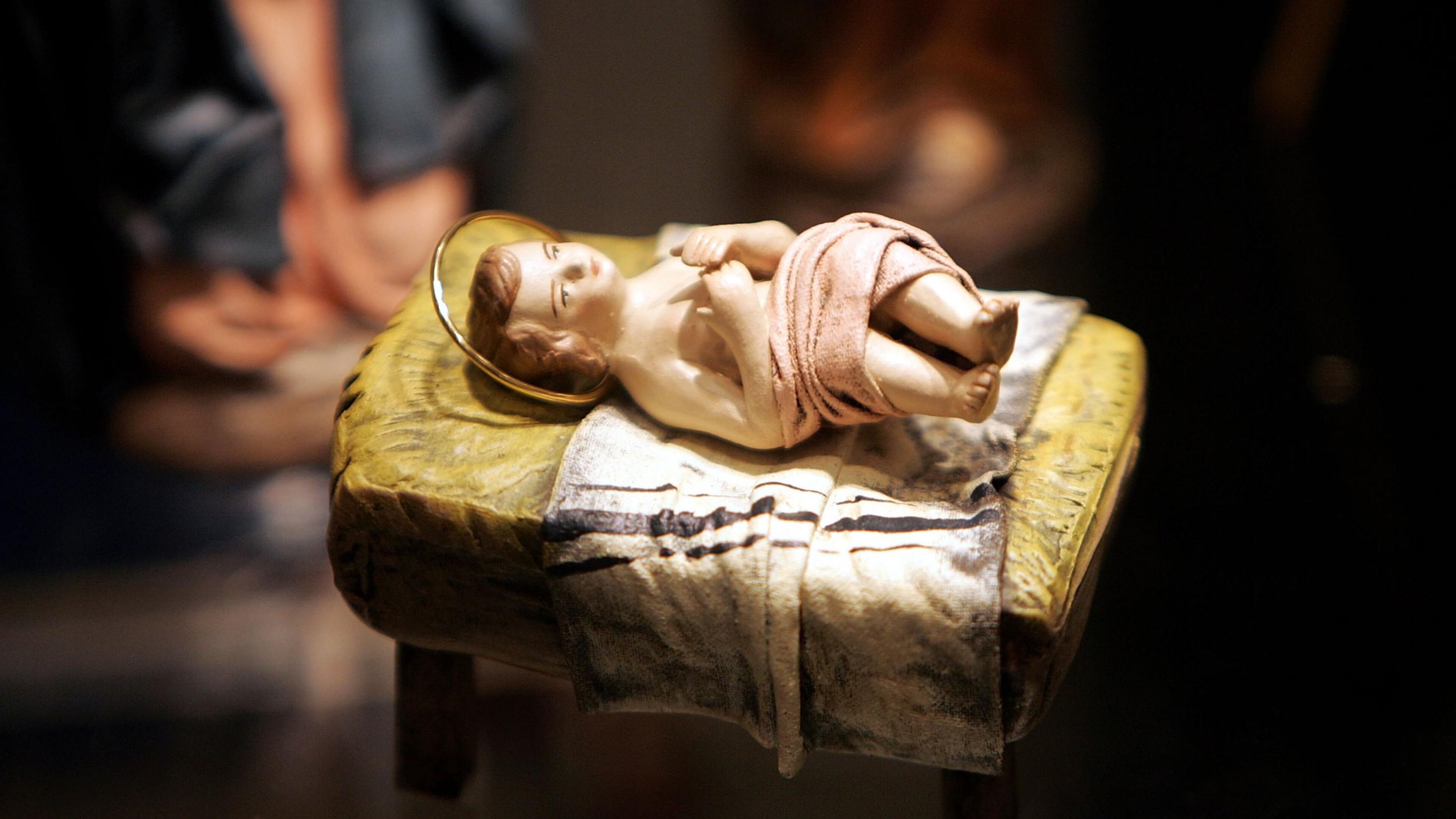 FILE PHOTO: A sculpture of a baby Jesus that is part of a nativity scene from Spain is displayed during a "Joy to the World" exhibit .