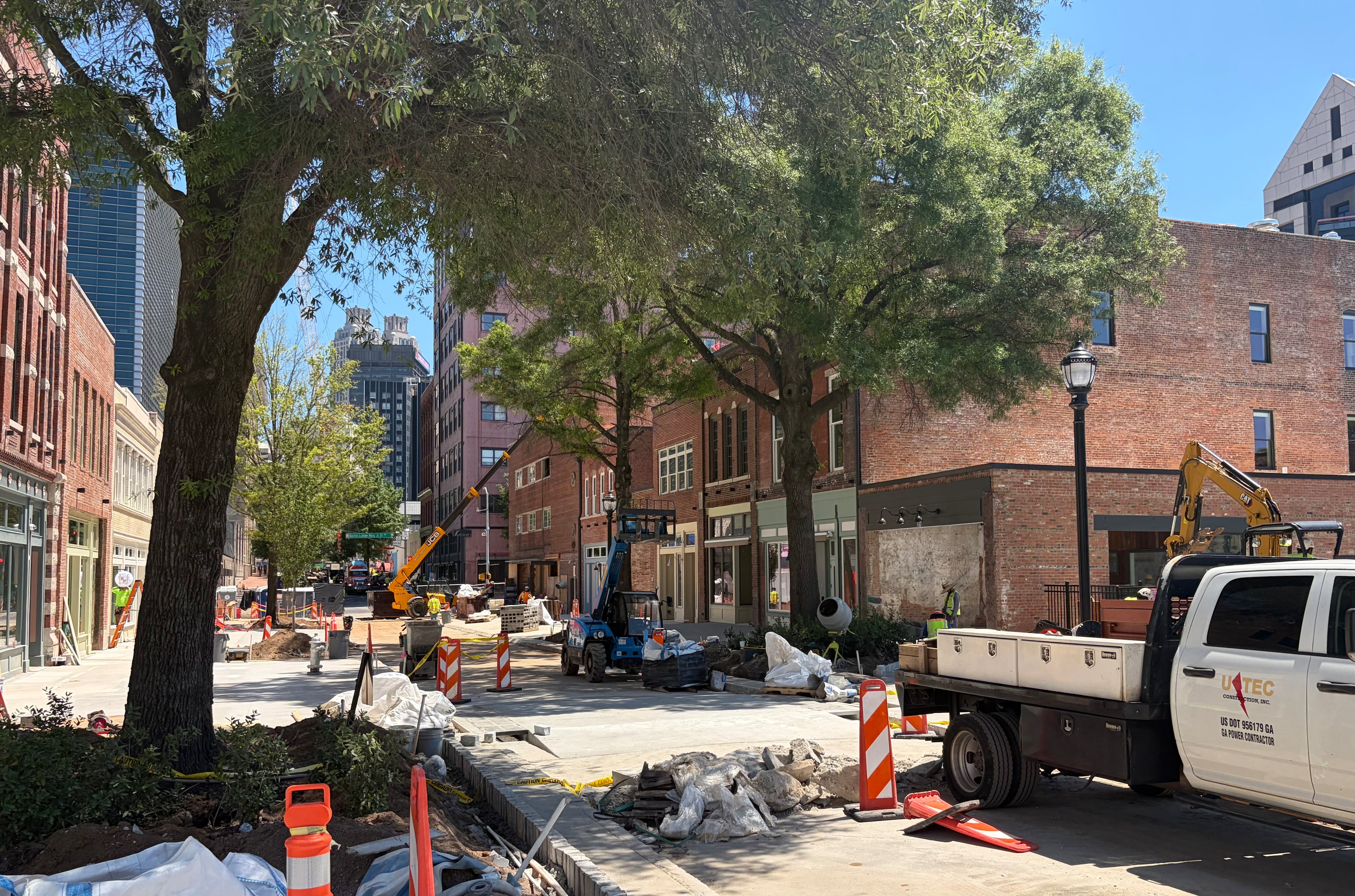 Construction crews busy themselves all along Broad Street in south downtown with the World Cup looming. (Bill Torpy/AJC)