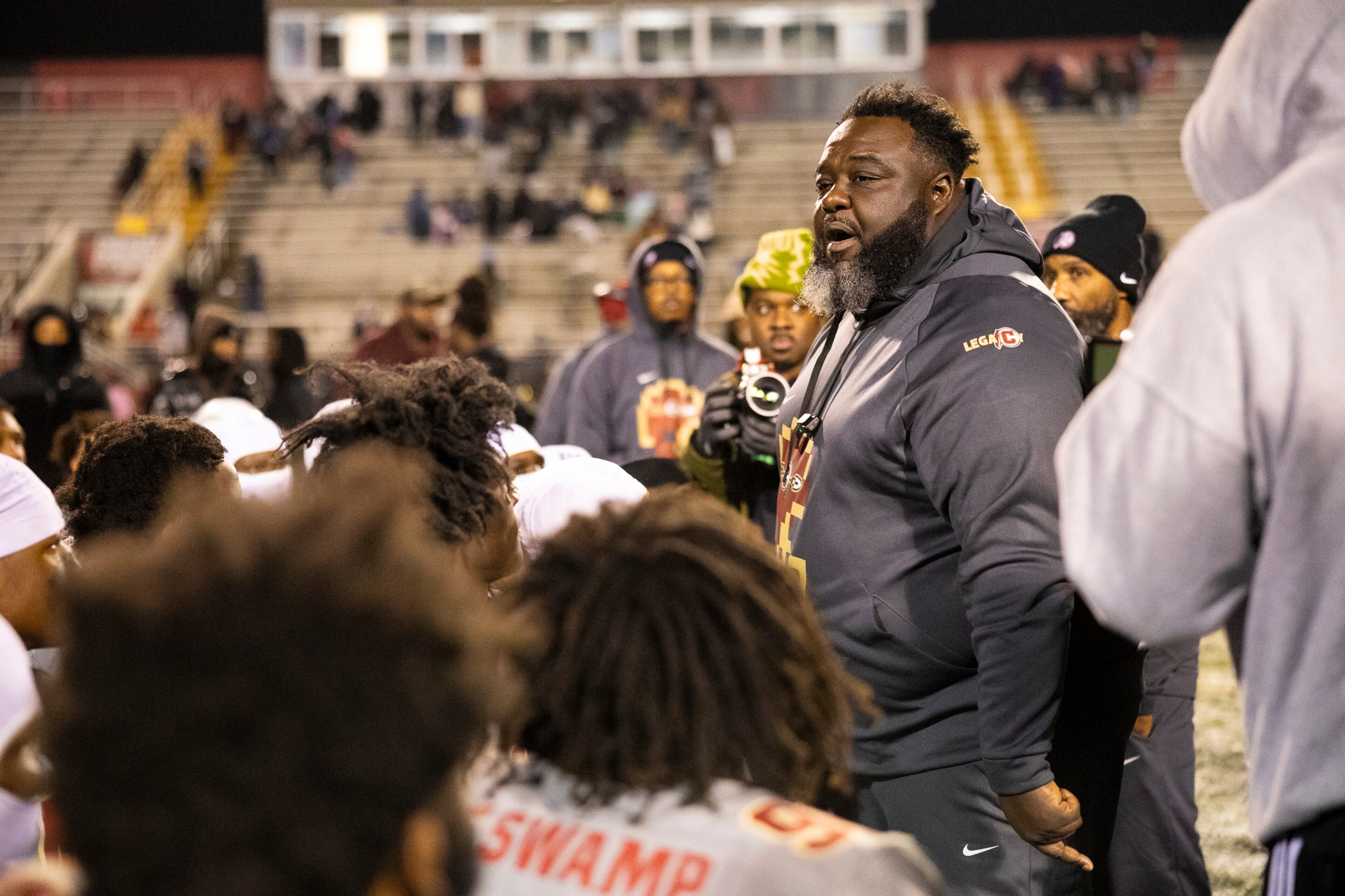 Creekside head coach Maurice Dixon speaks to his team after winning the Class 4A semifinal against Kell on Friday, Dec. 5, 2025, at Creekside High School in Fairburn. (Oscar Guevara Saenz for the AJC)