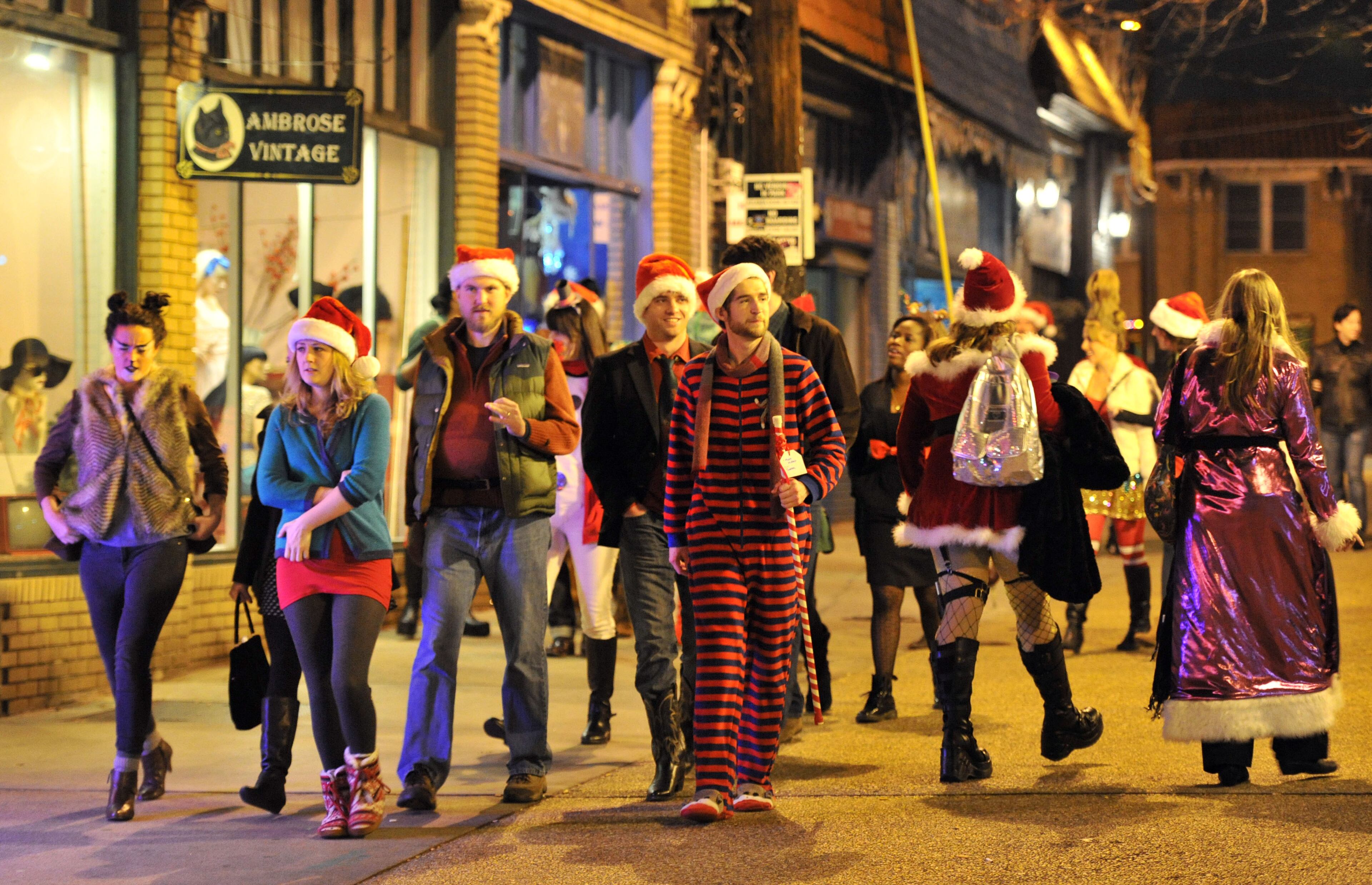 Participants show off their Santa gear in Little Five Points during the 8th annual DSB SantaCon on Saturday, Dec. 15, 2012. The event was also a canned food drive for local organization Lost & Found Youth.