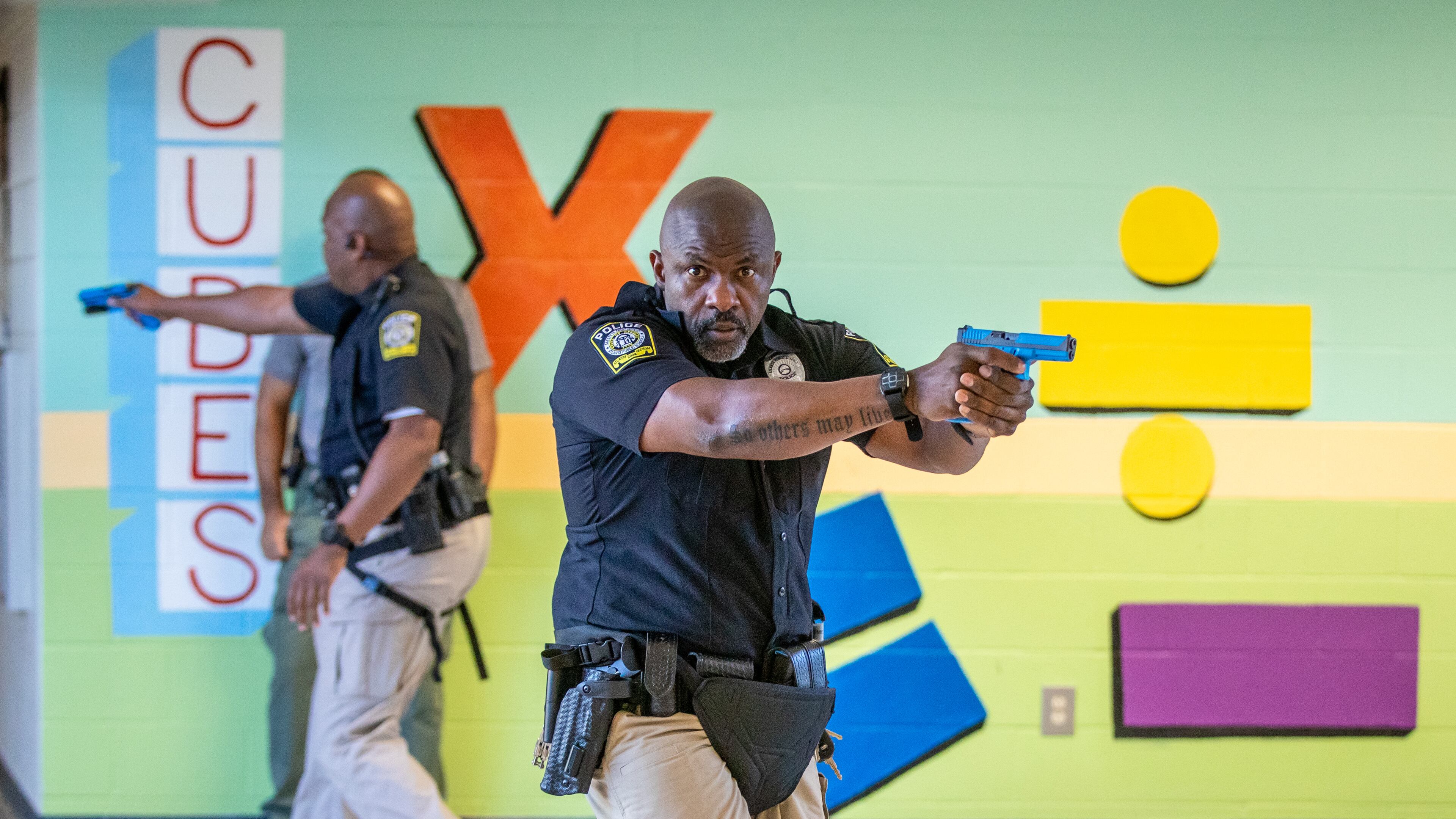 Atlanta Public Schools police officers participate in an active shooter training drill at the former Towns Elementary School in Atlanta on Thursday, July 28, 2022. (Steve Schaefer / steve.schaefer@ajc.com)