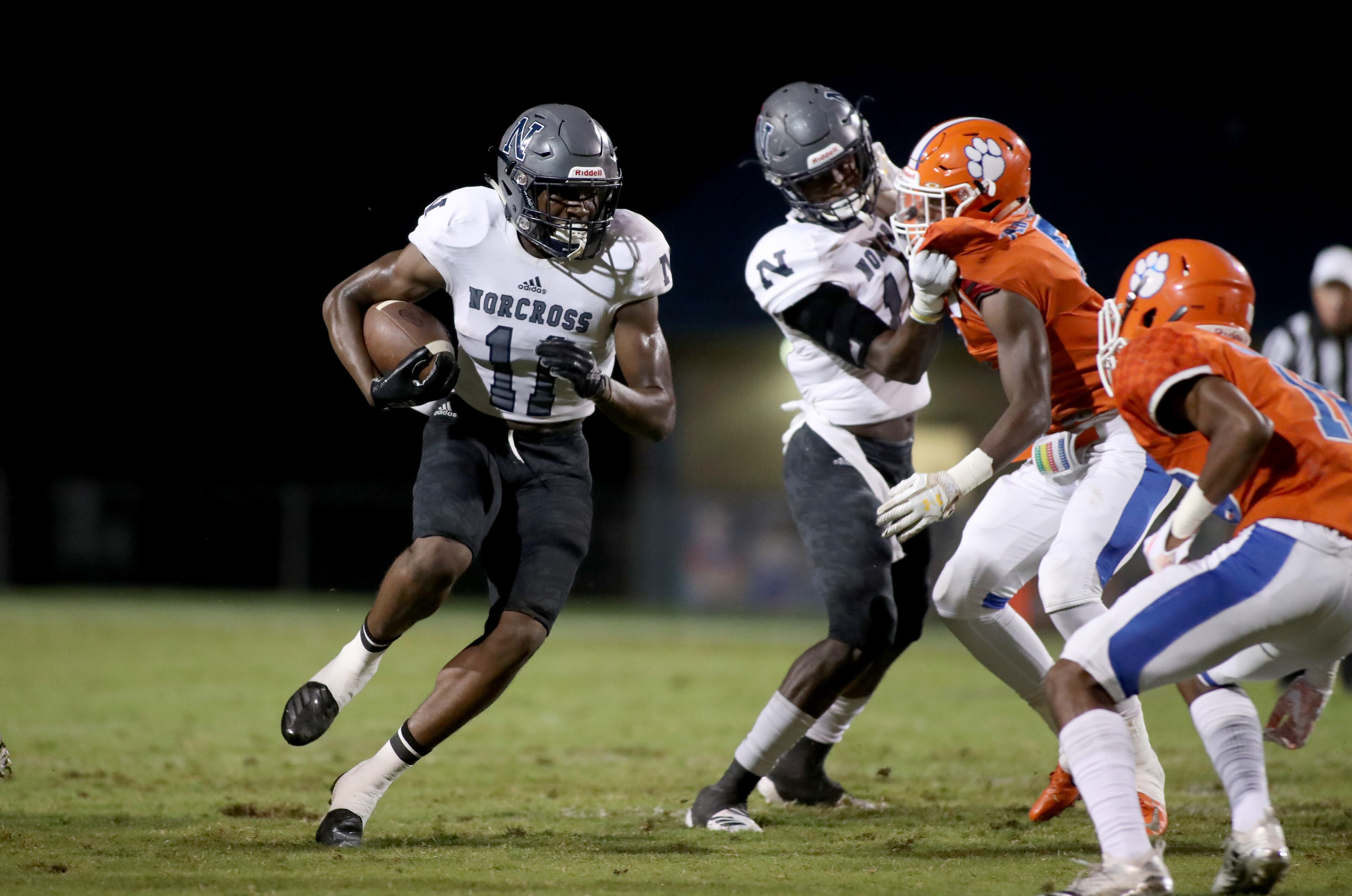 Norcross wide receiver Isaiah Wilson (11) runs after a catch during Friday's game. (Jason Getz/Special)