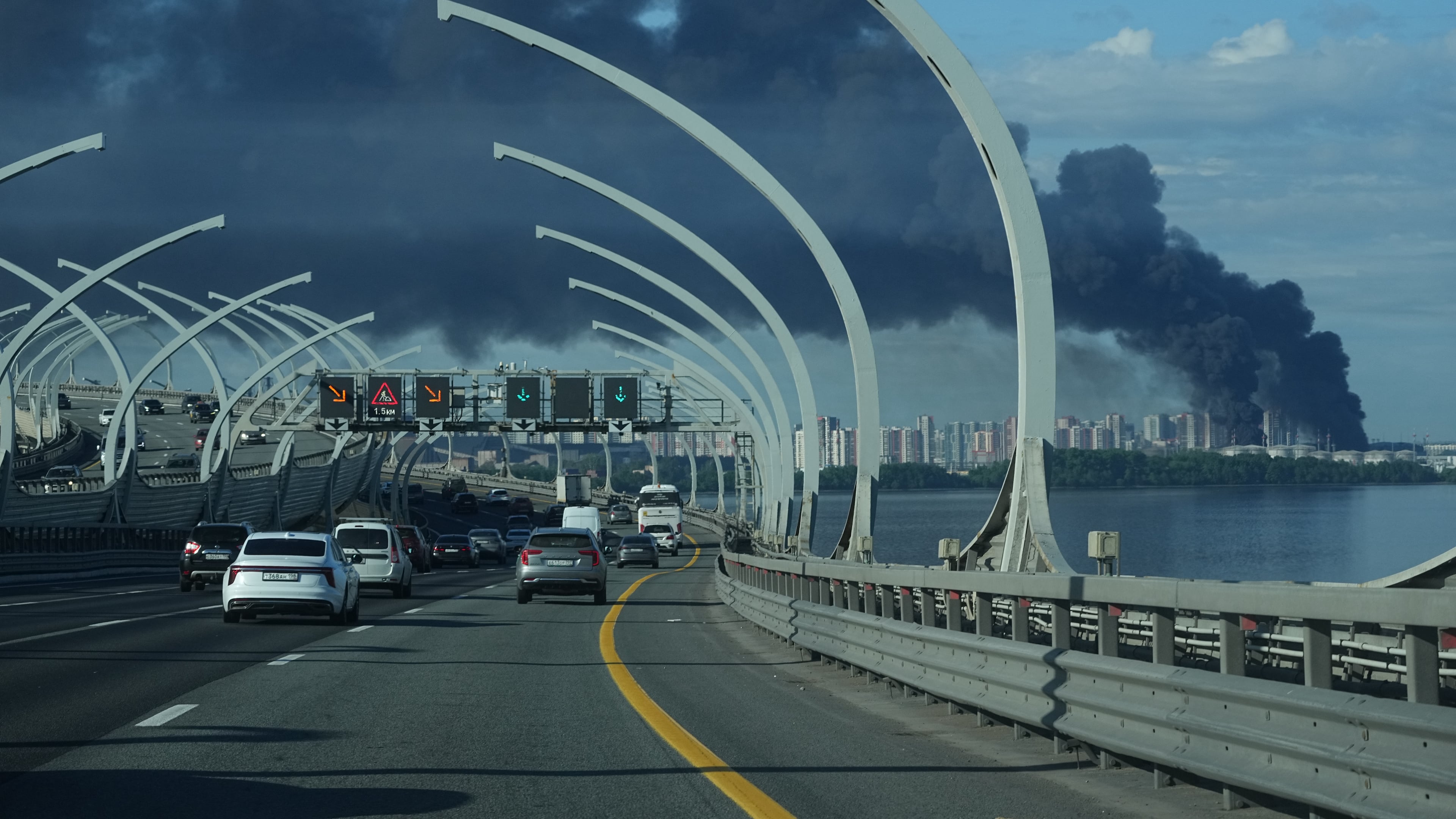 A plume of black smoke is seen over the port of St. Petersburg, Russia, Wednesday, June 3, 2026, after a Ukrainian drone attack. (AP Photo)