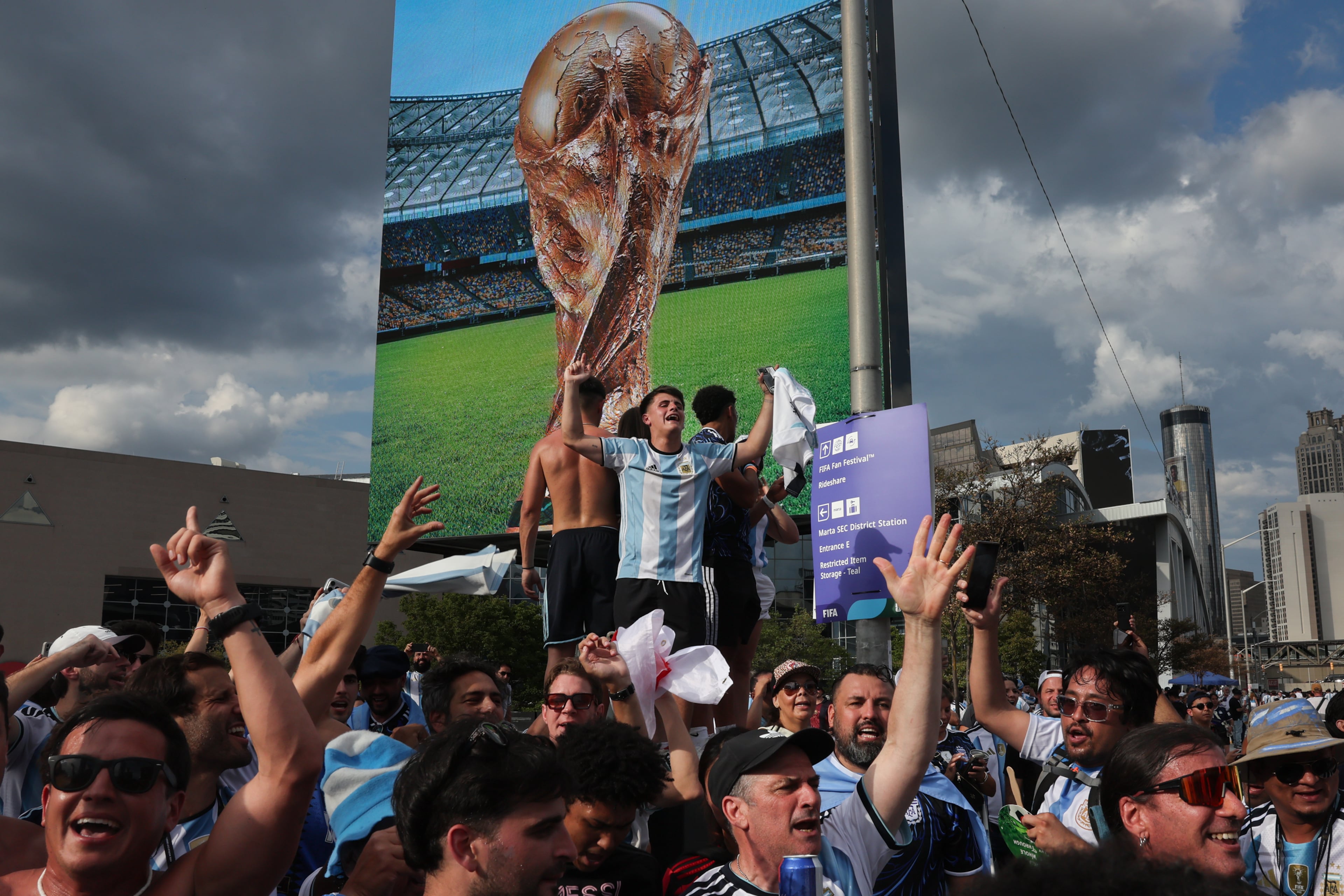 Argentina fans celebrate outside Atlanta Stadium (Mercedes-Benz Stadium) after Argentina wins the FIFA World Cup semifinal against England on July 15, 2026. It’s the last game Atlanta hosted. (Arvin Temkar/AJC)