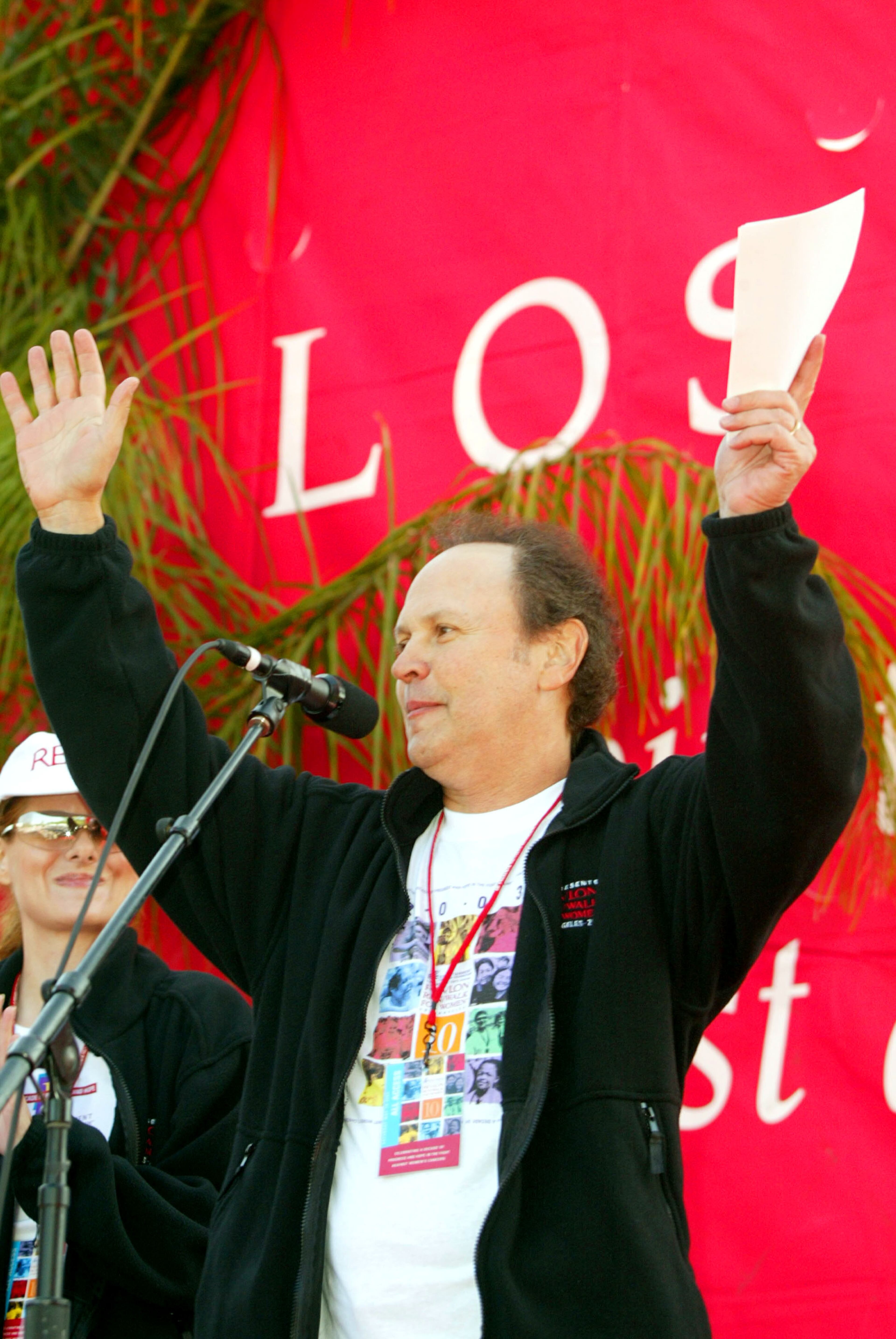 Actor Billy Crystal greets participants at the Revlon Run/Walk For Women at the LA Memorial Coliseum May 10, 2003 in Los Angeles, California. (Photo by Frazer Harrison/Getty Images)
