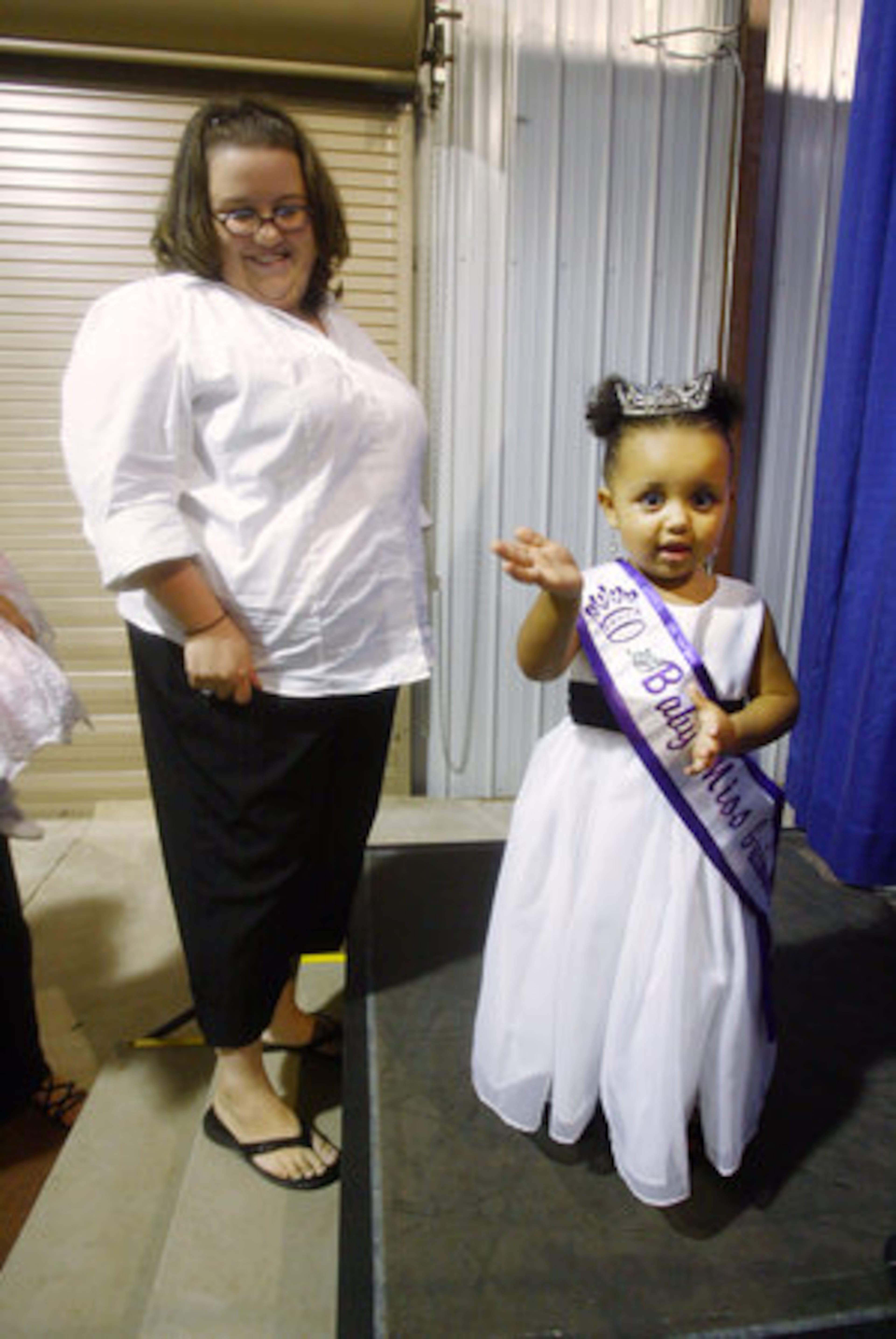 Samantha Brown's daughter, Jordan Brown, 2, prepares to take her farewell walk on stage as the outgoing 2007 Baby Miss Gwinnett.