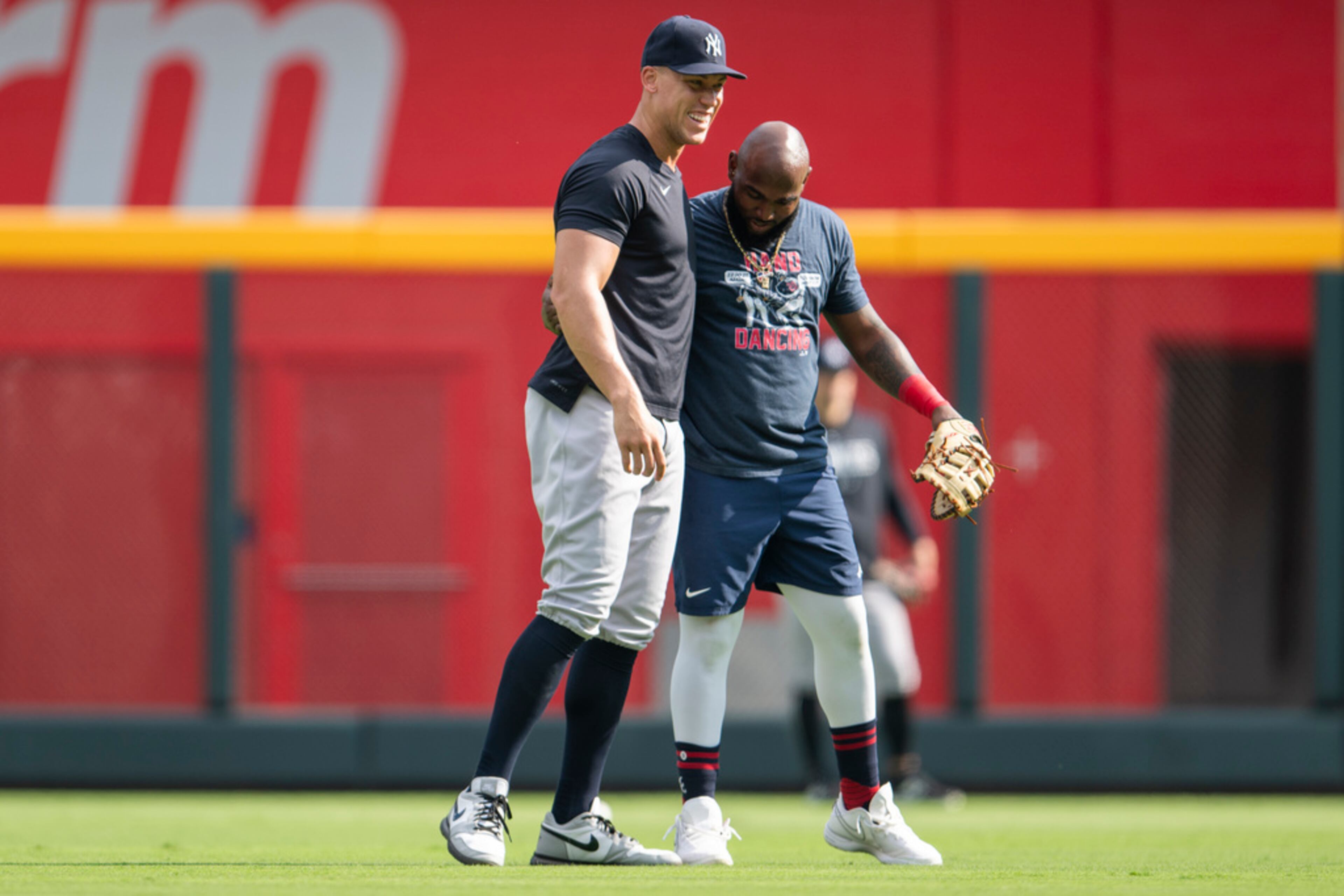 New York Yankees' Aaron Judge, left, smiles with Atlanta Braves' Marcell Ozuna before a baseball game Monday, Aug. 14, 2023, in Atlanta. (AP Photo/Hakim Wright Sr.)