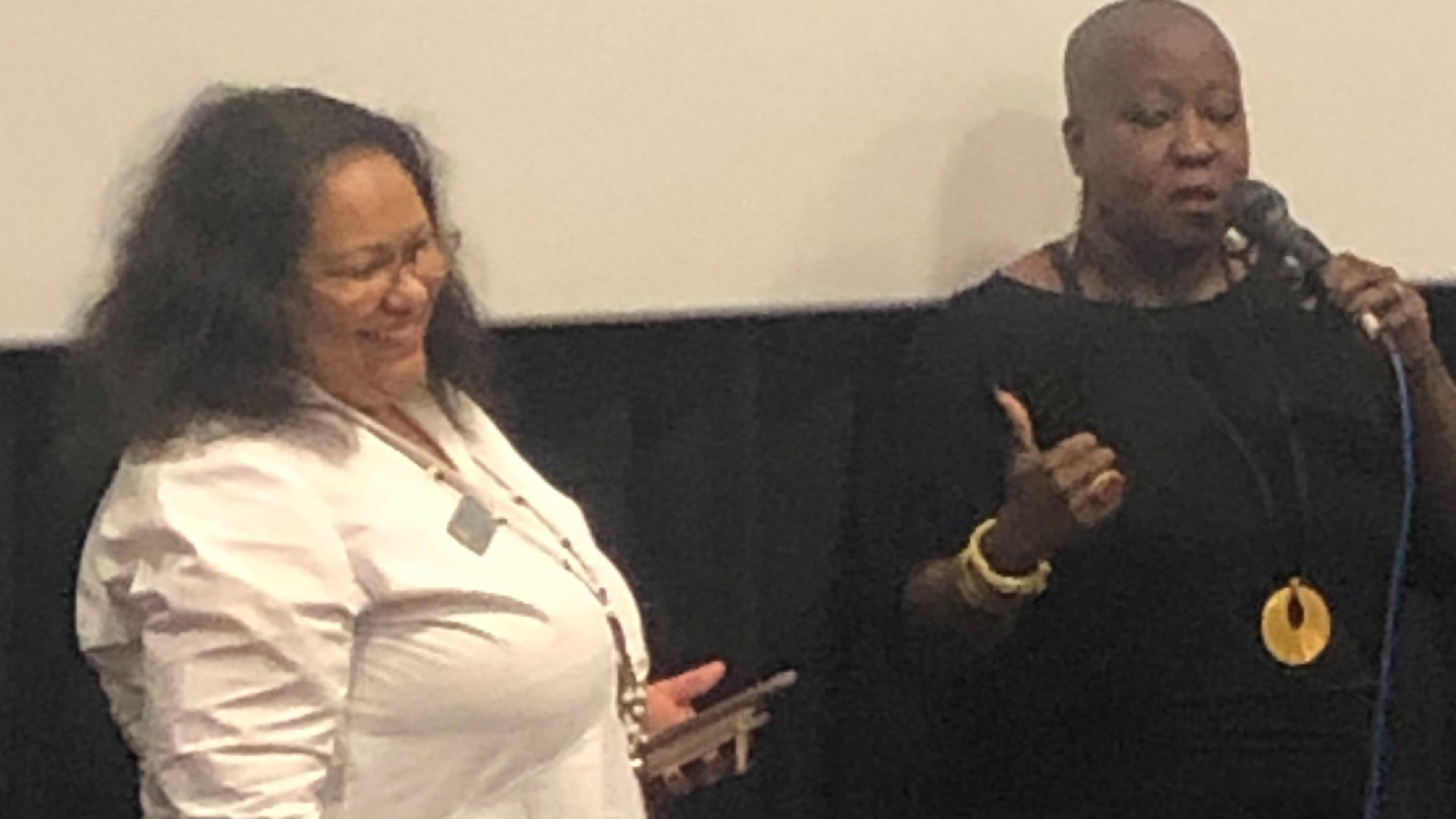 Iyabo Onipede, co-director of Compassionate Atlanta and Denitra Isler, a member of the cast of "Just Mercy," lead a discussion about the film following the fundraiser screening at AMC North DeKalb 16 Friday, Jan. 10. ARLINDA SMITH BROADY/AJC