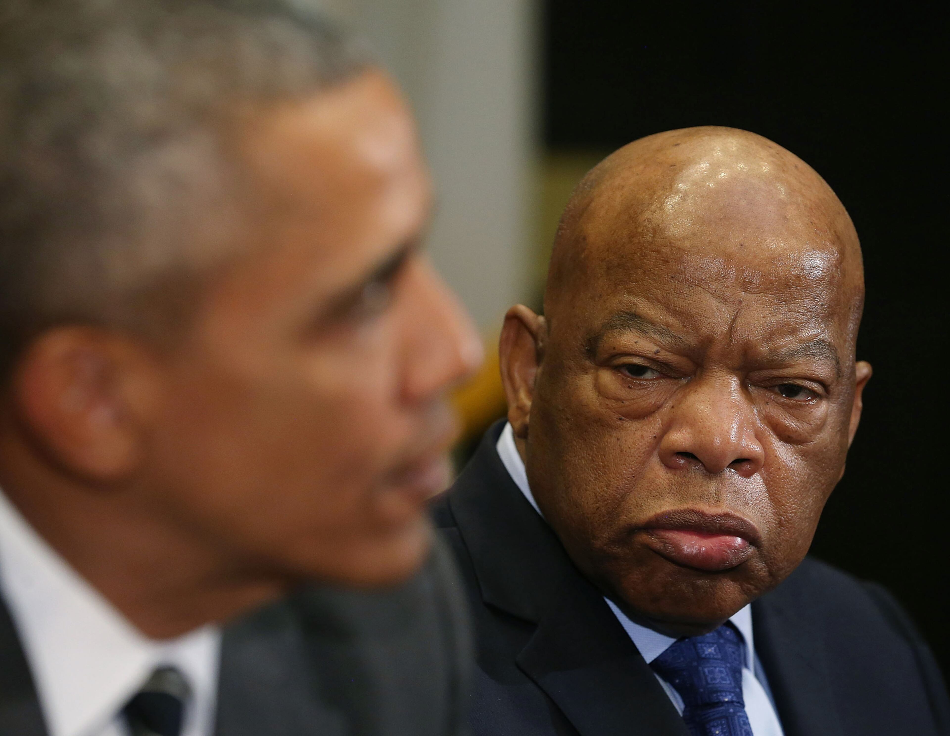 RACE RELATIONS PANEL--WASHINGTON, DC - FEBRUARY 18: Rep. John Lewis (D-GA) (R) listens to U.S. President Barack Obama speak about race relations, in the Roosevelt Room at the White House, February 18, 2016 in Washington, DC. President Obama met with African American faith and civil rights leaders before an event to celebrate Black History Month. (Photo by Mark Wilson/Getty Images)